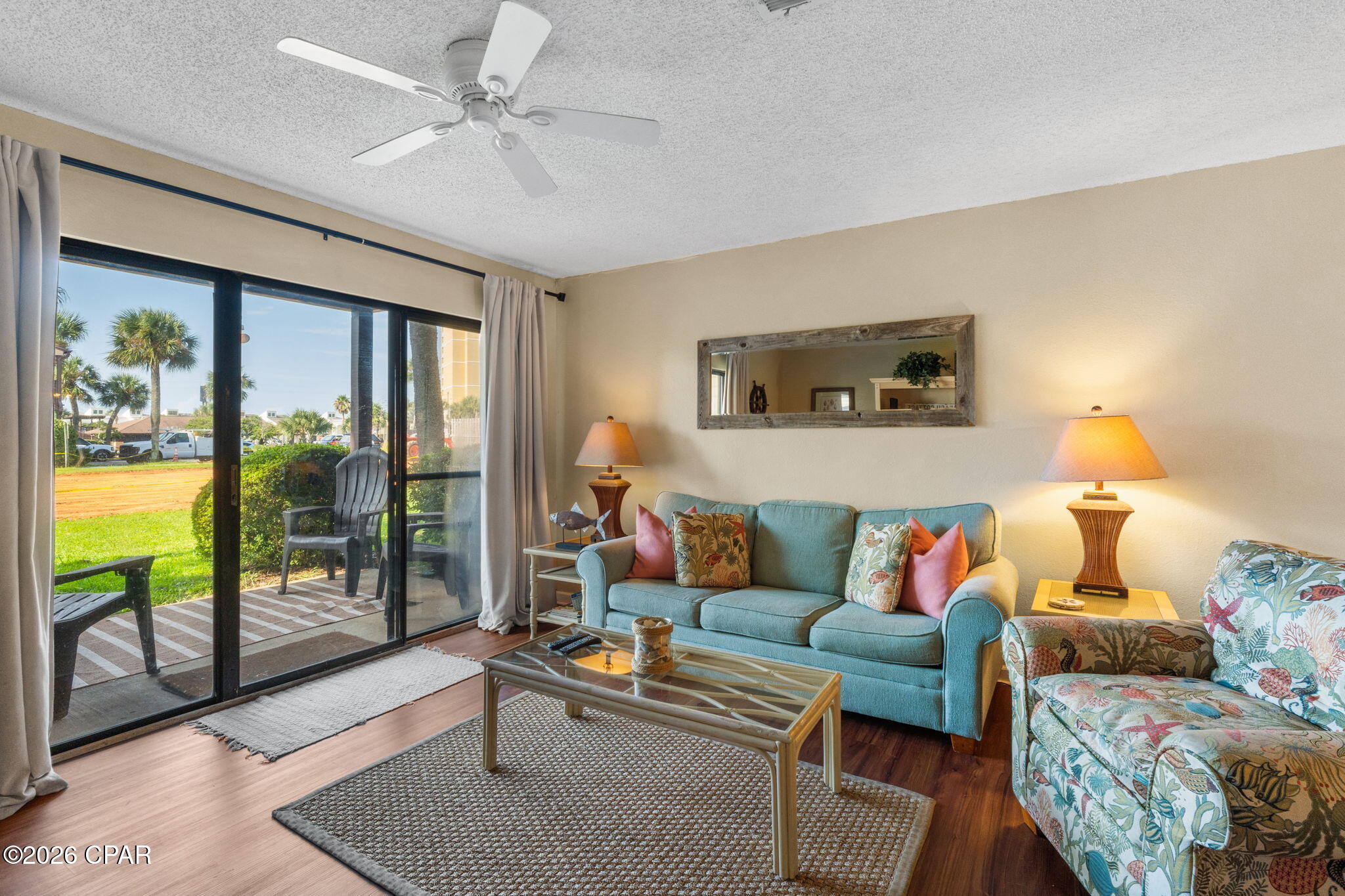 Location is everything.  Own a turnkey Panama City Beach condo for sale in the sought-after Portside community set on the quiet west end of Panama City Beach. This coastal-inspired 2-bedroom, 1.5-bath unit offers 1,120 square feet of comfortable living space, just steps from the front pools and beach crosswalk. This unit is located just beyond the office and pool parking. 
Built in 1984 and thoughtfully maintained, this furnished condo PCB is fully move-in ready -- bring your suitcase and start enjoying beach life. Tasteful coastal décor, soft breezy tones, and inviting furnishings create a relaxed retreat perfect for owners and guests alike. The kitchen features stainless steel appliances, blending everyday function with a fresh, updated feel.
With quick access to the sand, resort-style amenities, and a prime spot in one of the area's most desirable settings, this beachfront condo Panama City Beach lives easy and rents well. Strong rental potential makes it an excellent vacation rental investment or a low-maintenance personal getaway.
Location is everything, and Portside puts you close to the best of Panama City Beach dining, shopping, and entertainment. Located near Pier Park, Top Golf, and don't forget nearby Thomas Donuts for breakfast treats and lunch!