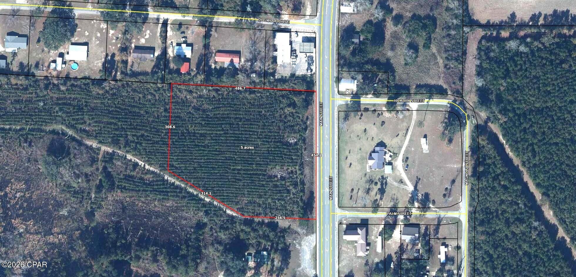 Located on the North end of Cottondale, within the City limits is approximately 5 acres, zoned mixed use, commercial. Approximately 465 front foot on hwy 231 which the FDOT daily traffic maps show 9100 vehicles a day, 4 lane highway with center turning lane. According to the City of Cottondale, public water is available and possibly sewer but needs confirmation from City and development department. Property is currently part of a hunting lease that will be cancelled by closing. Planted in lobloly pines in 2021
