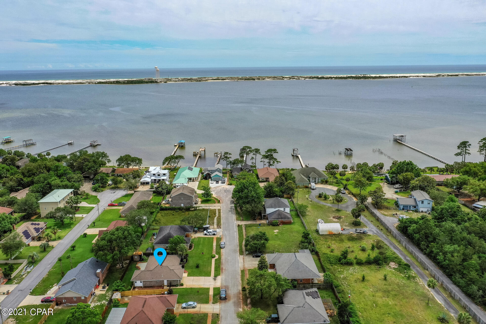 SOUTH OF HWY 98 with NO HOA! This gorgeous 3/2 family home is located in the subdivision of Bella Vista. A waterfront community with deeded sound access and quiet neighborhood with wonderful neighbors. Open floor concept with split bedroom plan that will check all the boxes. Enjoy the spacious living area with family and friends or relax with your gas fireplace on cold nights. HVAC and Hot Water heater are within last 6 years. Professional landscaping with a privacy fence are just a few more perks to this wonderful home. Situated in East Navarre where you are 8-10 minutes to Hurlburt Field and Navarre Beach. Buyer to verify all information deemed important.