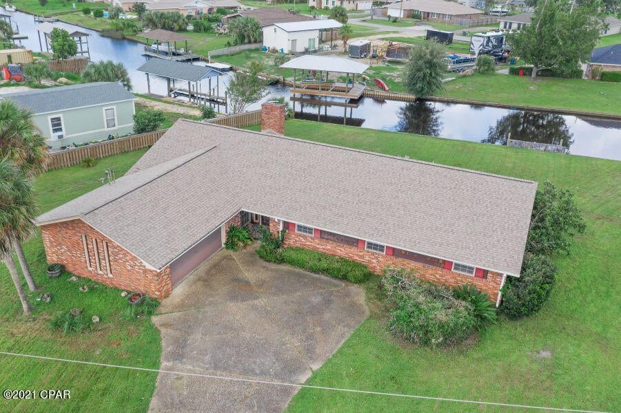 Fantastic Canal-Front home in a Highly Desirable Neighborhood. Half-Acre lot with quick boating access to the bay and the gulf right from your back yard. Home features 4BR/2BA with large rooms, newer roof, and newer HVAC. Turn this blank canvas into your dream home. *** All measurements are approximate. Please Verify if Important ***