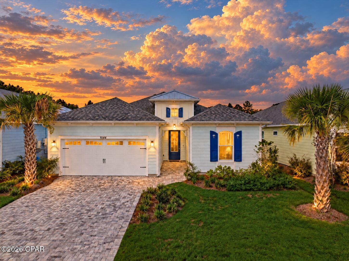 Some homes are built. Others are composed.

Every finish, every upgrade and every thoughtful detail at 9144 Caribbean Soul Way was chosen to create something far beyond the standard Coconut. With more than $145,000 in documented builder options, this 2-bedroom, 2-bath home with a private den tells its story through craftsmanship, comfort and the unmistakable feeling that someone thought of everything.

Impact glass windows and sliding doors bring confidence without compromising the light. Eight-foot interior doors add height and presence. Rich, uninterrupted hard-surface flooring carries you from room to room, while designer ceiling fans, recessed lighting and a beautiful gas fireplace give the open living space warmth, polish and personality.

Then there is the kitchen the heart and showpiece of the home. An extended island wrapped in Calacatta Marina quartz creates a natural gathering place, framed by Admiral cabinetry, crown molding, a full-height picket mosaic backsplash and under-cabinet lighting. A wall oven, built-in microwave and cooktop complete the elevated design, while pullout shelving, soft-close dovetail construction, pots-and-pans drawers and double trash storage prove that beauty here is backed by brilliant function.

Both baths feel intentionally finished, with quartz countertops, upgraded cabinetry, tile extended to the ceilings and seamless glass shower enclosures. Even the laundry room was given the designer treatment with cabinetry, a utility sink and quartz countertops.

Outside, an expansive screened paver lanai creates the kind of space where morning coffee stretches into afternoon cocktails and good conversations refuse to end. The garage is equally impressive with an epoxy floor, insulated walls and ceiling, attic storage, a dedicated outlet and an impact-rated insulated door.

Smart-home automation, enhanced security, whole home blinds, a paver driveway and countless behind the scenes conveniences complete a home that was never designed to feel ordinary.

This is more than a Coconut. It is what happens when one of Latitude Margaritaville Watersound's most loved floor plans is given imagination, intention and a serious upgrade.