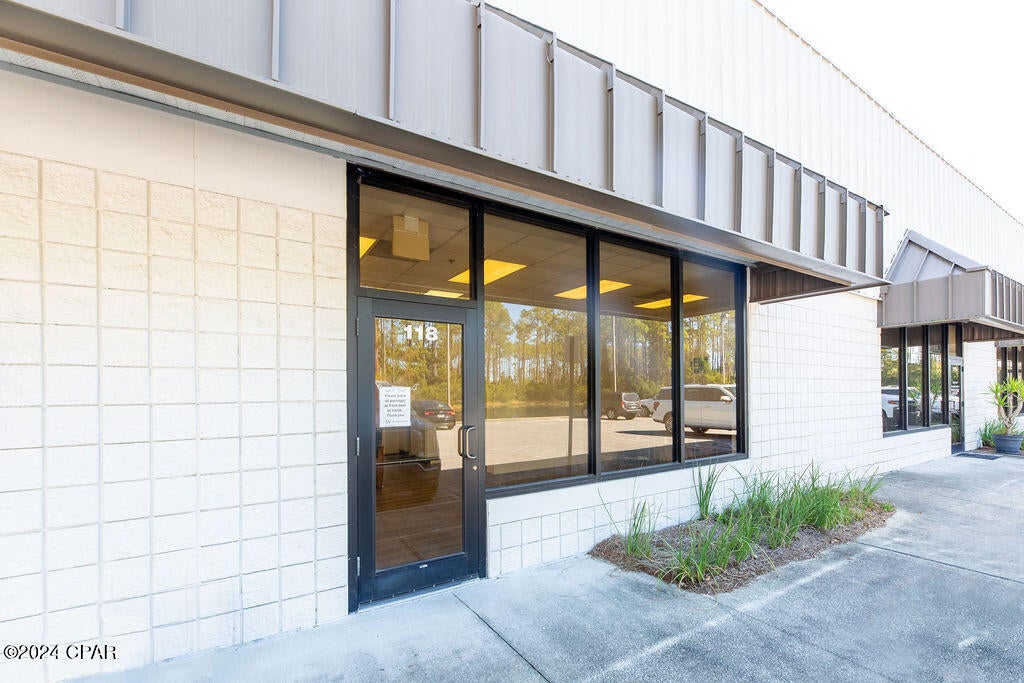 Prime Office/Warehouse Space in the desirable Beach Commerce Park in Panama City Beach. 

Don't miss this opportunity to own a versatile 2,000 sq ft office/warehouse property located in the heart of Panama City Beach! 600 Sq. Ft. of office space and 1,400 Sq. Ft. of warehouse/shop/storage space. A grade-level door with clearance of 12'8', this property will work for a variety of different businesses. Situated in a highly sought-after area with easy access to major highways, local amenities, and just a 10 minute drive to the airport, this commercial space is perfect for businesses looking to expand or relocate to a thriving business district.

Schedule a tour today and see how this versatile property can meet your business needs!
