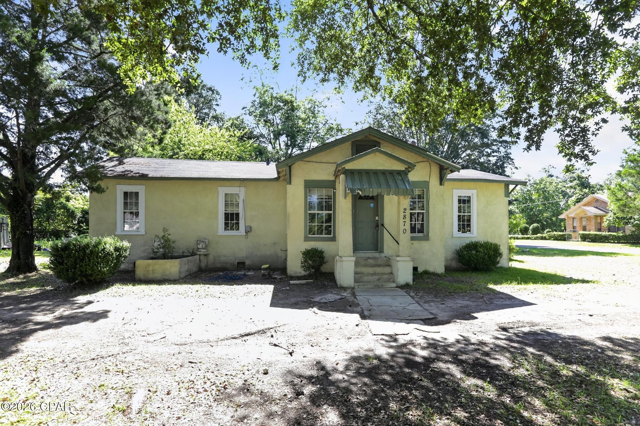 Handyman special with big potential off Penn Ave! This one-story home features spacious rooms, wood floors, abundant natural light, a kitchen with black cabinetry, full bath, mature shade trees, and a partially fenced yard. Roof 2019, HVAC 2018 but updates are needed, making it great for investors or buyers ready to build equity. One of Marianna's best-priced homes--bring your tools and vision!