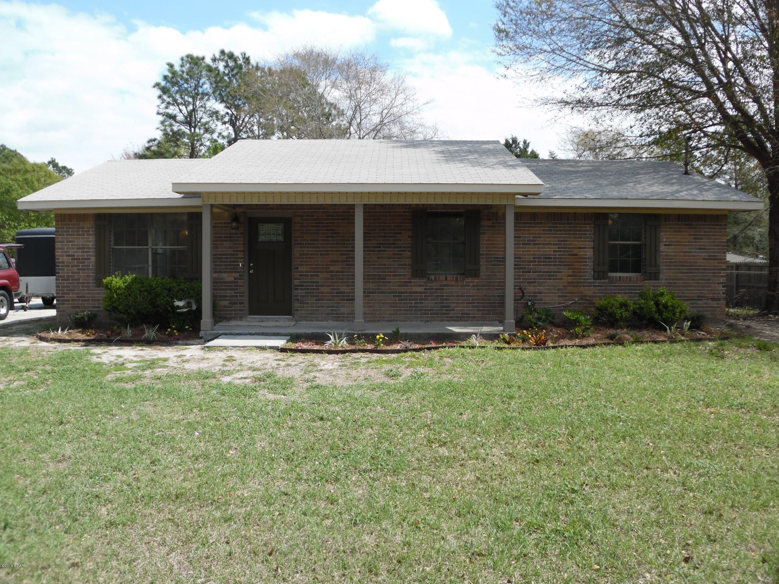 This beautiful brick home will not last long.  It has been completely remodeled and is move-in-ready with all new AC, countertops, appliances, bathroom vanities, flooring and paint. This is a great opportunity to get a like new home, on almost 3/4 acre, at an affordable price!  The entire lot is fenced, with a drive-thru gate.  The yard is cleared, mowed and easy to maintain.  The brick exterior is maintainence free and there is a deck on the rear of the house, perfect for b-b-q's or family get-togethers, plus there is plenty of room for the entire soccar team or football fans! Make an appt today, as a home with all this, at this low price, does not come along very often. (All info is approximate and should be verified if important to the buyer.)