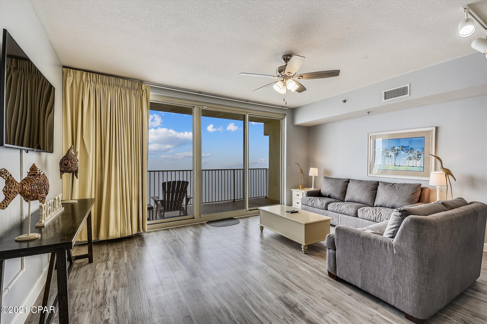 Million Dollar Views from this premium RARE AVAILABLE one bedroom with a bunk room GULF FRONT unit located in one of premier resorts in Panama City Beach. Soft neutral tones throughout, complement the exquisite décor as you enjoy the gorgeous sunset views! INCLUDES A DEDICATED, COVERED PARKING SPACE. Great primary residence, vacation home, or investment property. Shores of Panama, is a 23 story Tuscany style condominium of gulf front luxury accommodations offering unparalleled amenities including almost 500' of Gulf frontage, 13,966 sq. ft. million dollar Gulfside, zero entry lagoon-style gulf side pool, Gulf side hot tub, Large heated indoor pool & hot tub, Covered on-site parking deck, Health center with fitness equipment, Two tiki bars serving lunch and dinner, Beach activities and rental services, Free high-speed internet access,  and more, surrounded by beautiful exterior details. The Shores of Panama is an excellent location on the beach next to Pineapple Willy's and is within walking distance of other restaurants and entertainment. Like thousands of visitors each year, your family will LOVE Shores of Panama.