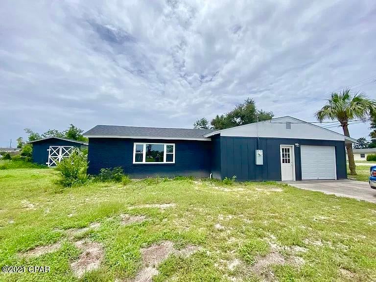 Hurry this will not last long! This recently renovated home has new paint inside and out new flooring and a newer roof! Plenty of space inside for those cozy family evenings by the fireplace. This home offers a large lot for family gatherings and summertime cookouts or hanging out with friends in the workshop.  Beautiful colors to match that modern decorating flair. This home is move in ready and is centrally located minutes from everything.