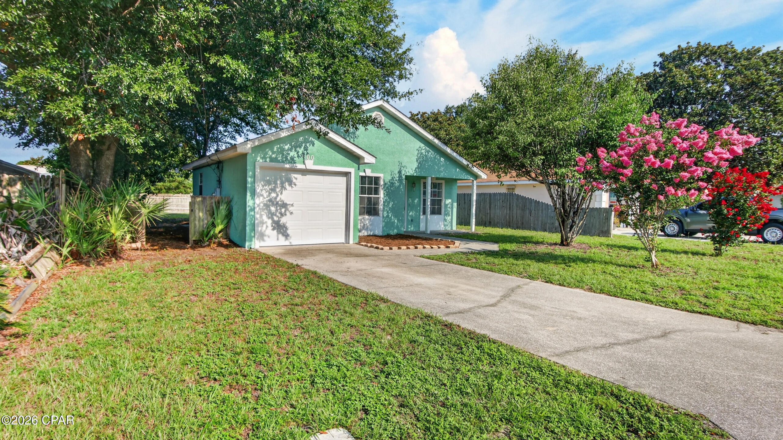 Welcome to your slice of paradise in Panama City Beach! This charming, well built home is situated on a quiet street within walking distance to the sandy beach, with Maggi Still Memorial Park only a 5 minute walk away. This golf cart friendly neighborhood does not allow vacation rentals, perfect for a quiet retreat or full time living. 

Updates include all new paint, sleek vinyl plank flooring, and modern lighting fixtures. The roof, air conditioning, and water heater all replaced in 2018. Hurricane clips help keep your insurance costs lower. A backyard patio enjoys natural shade all day and plenty of room for a garden, pool, or workshop. 

Just 3 miles away, Pier Park and Frank Brown Park provide endless entertainment with dining, shopping, and attractions like the new Pirates Voyage Dinner & Show, Top Golf, music festivals, pier fishing, dog beach, movie theater, parades, car shows, scenic walking paths, sports park, and so much more! This prime location near the beach and local vibrant offerings is unmatched so schedule a showing today and discover coastal living at it's finest.