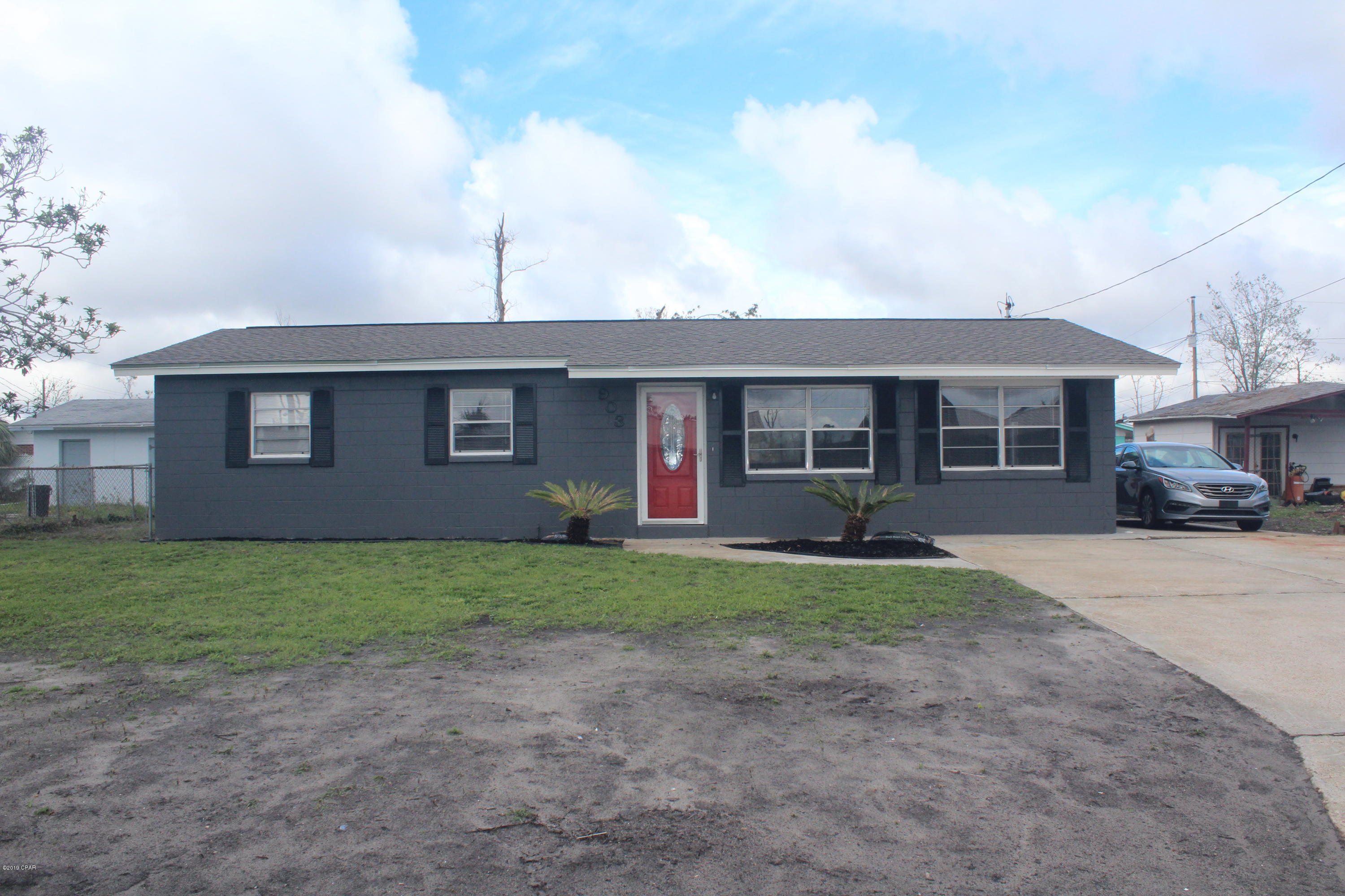 This sturdy block home has been updated to include modern kitchen, large master suite, new roof, updated doors, lights, fixtures, new paint (inside and out) and carpet. The kitchen was tastefully remodeled a few years back. There is a dining area or breakfast area beside the kitchen. The enclosed garage could be used as a formal dining room, den or 5th bedroom. The large master bedroom consists of French door entry, exterior exit door to the covered back patio, walk in closet and updated bathroom. The home currently has 4 bedrooms but could easily be a 5 bedroom home by adding a door to the enclosed garage. The home has a nice size 70x109 high and dry lot.  There are not many homes on the market in this price range.  You will be pleasantly surprised once you walk through the front door.