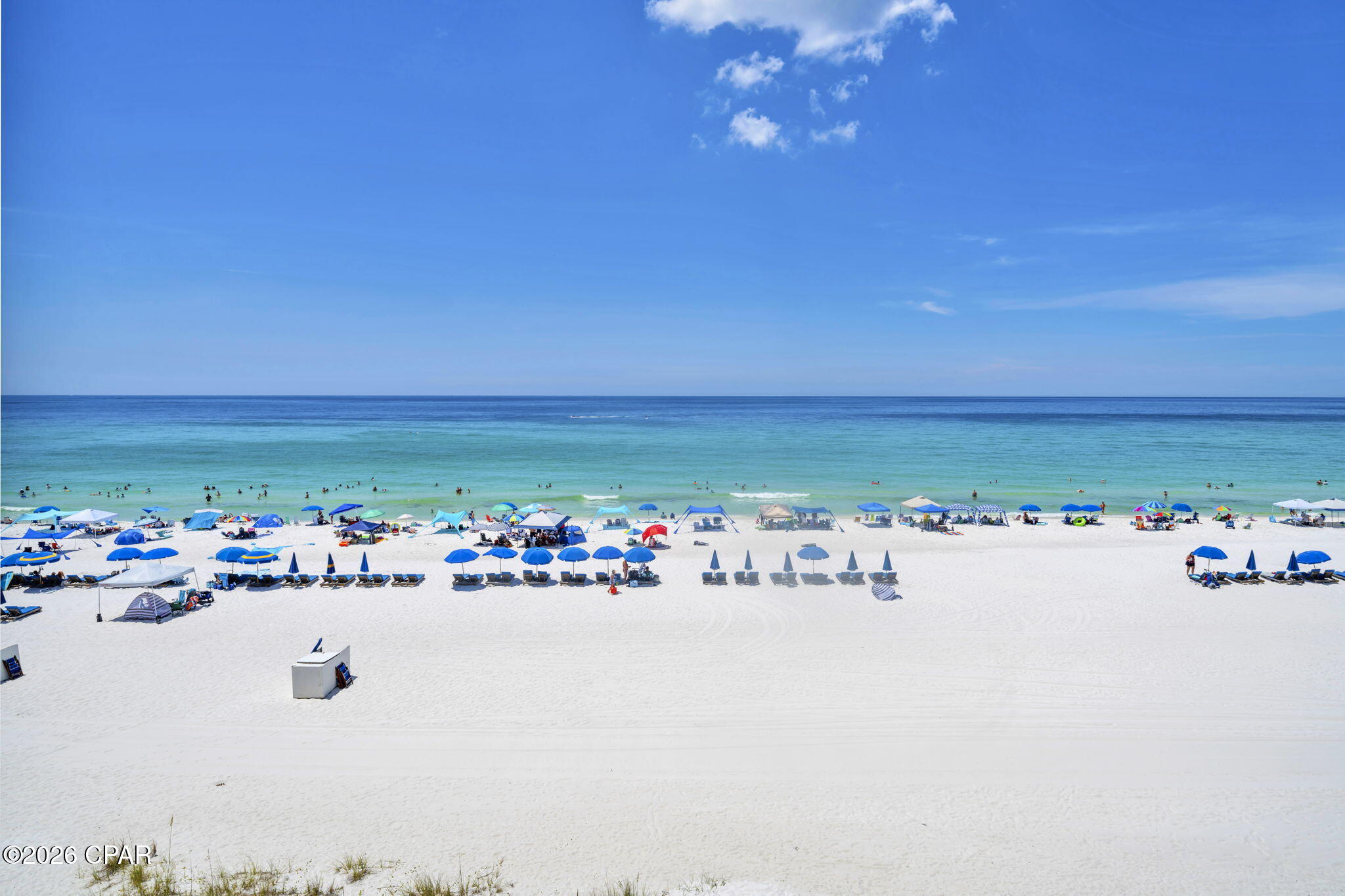 .61 FEET OF WRAPAROUND BALCONY. 180-DEGREE GULF VIEWS. TWO GULF-FRONT BEDROOMS. This 1,470-sq.-ft. Summerhouse wraparound offers one of the most distinctive 2-bedroom floor plans on Thomas Drive, with floor-to-ceiling glass spanning the Gulf side of the residence and unobstructed views from sunrise to sunset. With no neighboring building blocking the western view, the wraparound balcony provides multiple outdoor living areas and the opportunity to find a protected spot even when the Gulf breeze picks up.

Inside, both spacious bedrooms enjoy Gulf-front positioning, while the open living and dining area is surrounded by natural light and water views. The kitchen has been updated with countertops, backsplash, hardware and cabinetry and includes a large pantry and generous workspace. The condo is offered furnished and is well suited for a second home, full-time beach residence or short-term rental.

The 4th-floor location is especially appealing--high enough for expansive Gulf views while offering convenient access compared with upper-floor residences. Summerhouse is a longtime favorite on the quieter east end of Panama City Beach, with two pools (one heated), kiddie pool, hot tub, Gulf-front gazebo, BBQ areas, tennis, pickleball, racquetball and shuffleboard, plus an owners' lounge and onsite HOA and rental offices. St. Andrews State Park, Grand Lagoon marinas, restaurants and shopping are just minutes away.

This is not the standard Summerhouse 2-bedroom floor plan--the additional square footage, wraparound exposure and extraordinary balcony are what set #415 apart.