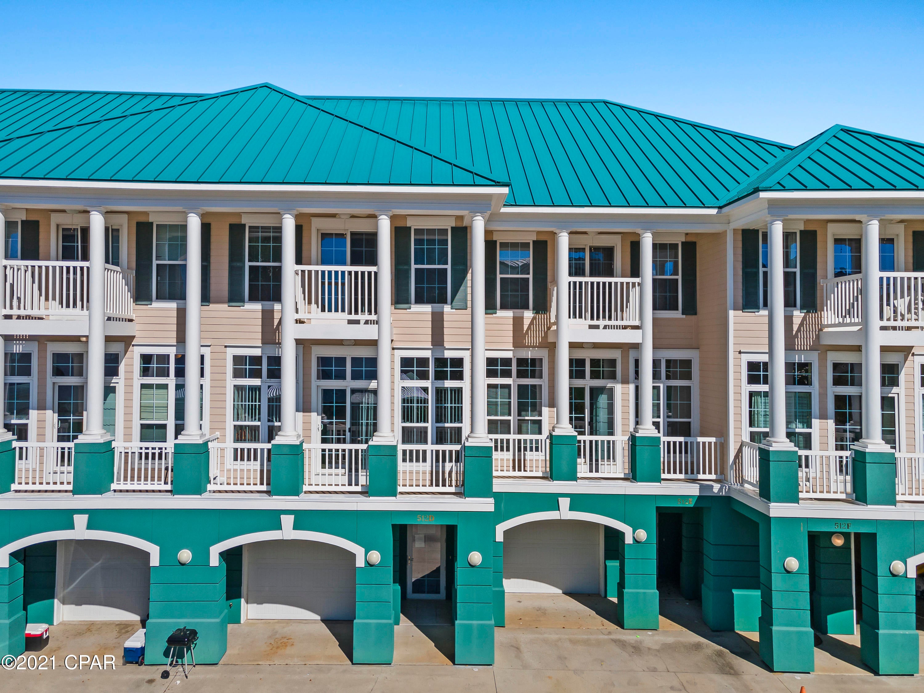 Gulf View and just steps from the sandy white beaches. This 5 Bedroom, 4 1/2 baths and two Kitchen Townhome is located just off Front Beach rd. The 1st floor area can be used as a Mother in law suite, complete with kitchen and full bathroom. Located behind the garage is a complete self-contained lockout closet, perfect for guests or renting. Enjoy the luxury of your own personal and private Elevator to navigate between floors. Second floor has a large great room along with kitchen and dinning room. This floor has one bedroom with private bathroom, plus additional half bath. Third floor consists of the Master Suite along with two more additional bedrooms on the opposite side of the floor. This beautiful unit is a must see! SHORT TERM RENTAL ALLOWED $67,370 already booked for 2021 as of June