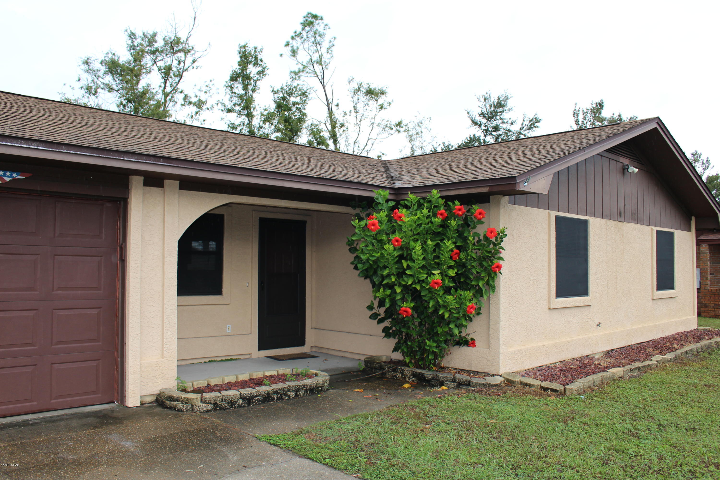 LOCATION, LOCATION. This cute 3 bedroom, 2 bath home centrally located in Lynn Haven. Raised ceiling with beams in living area, open floor plan,  kitchen with stainless steel appliances and pantry,  vinyl flooring throughout living and master bedroom, laundry/mud room with washer & dryer connections, single car attached garage. Screened in porch overlooking the fenced in back yard, with shed for your use. 

Close to schools and shopping.     

Pets neg with pet fee.