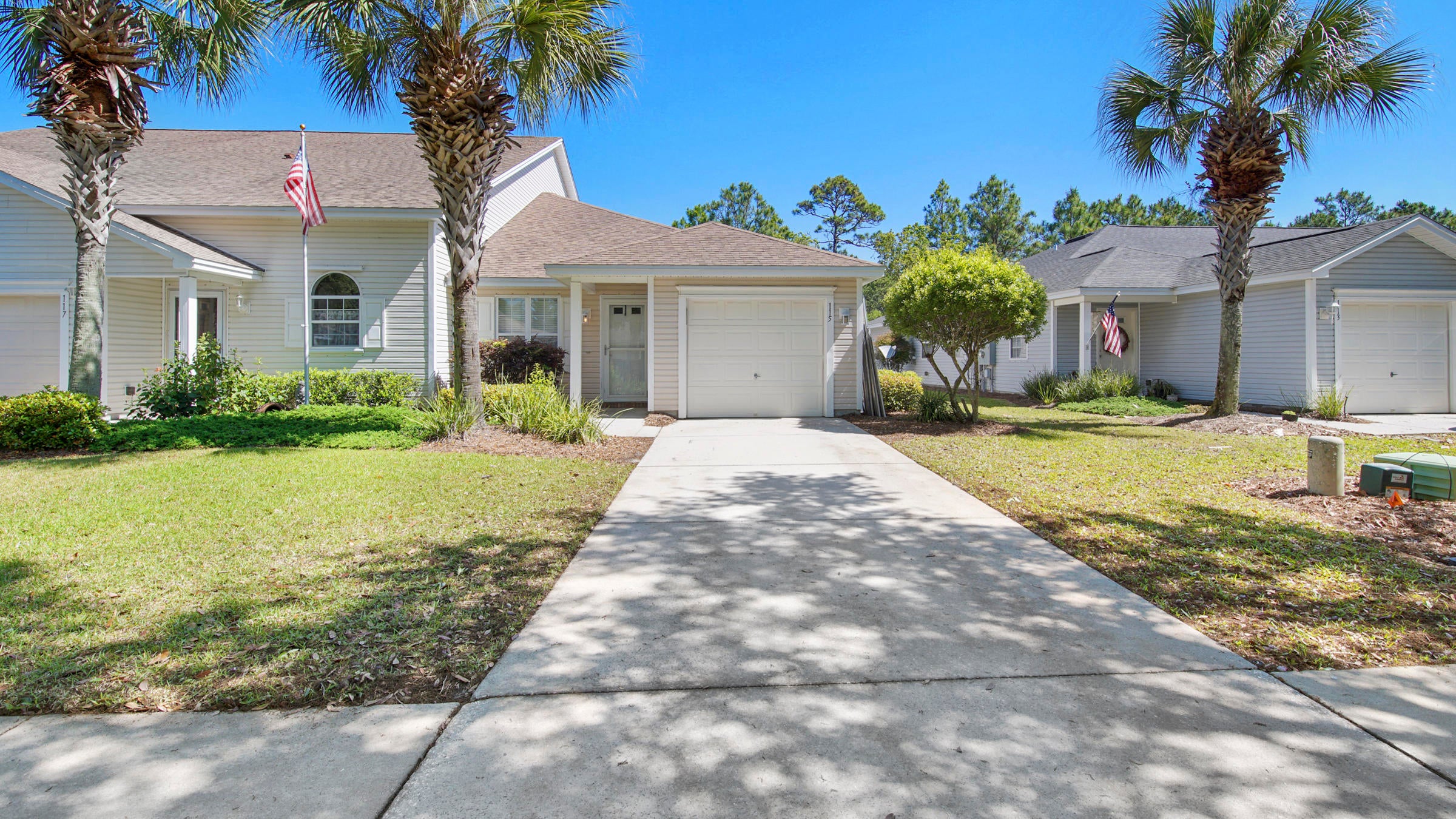 Welcome to the quietest most golf cart friendly neighborhood in Panama City Beach! Palmetto Trace is centrally located with just a 1 mile bike ride to the beach and right around the corner from all the shopping/restaurants of Pier Park. Public sidewalks with shade trees run throughout and access to your own two neighborhood pools is included.



This well kept home boasts  beautiful wood plank tile throughout for easy cleaning.  Kitchen has stainless steel appliances, new light fixtures and recessed lighting, and a moveable island for extra storage. Home is newly painted including the garage floor!



This quiet end unit shares woodlands on the back side of property and yard maintenance is covered by HOA. Easy living! All measurements are approximate and should be verified if important.