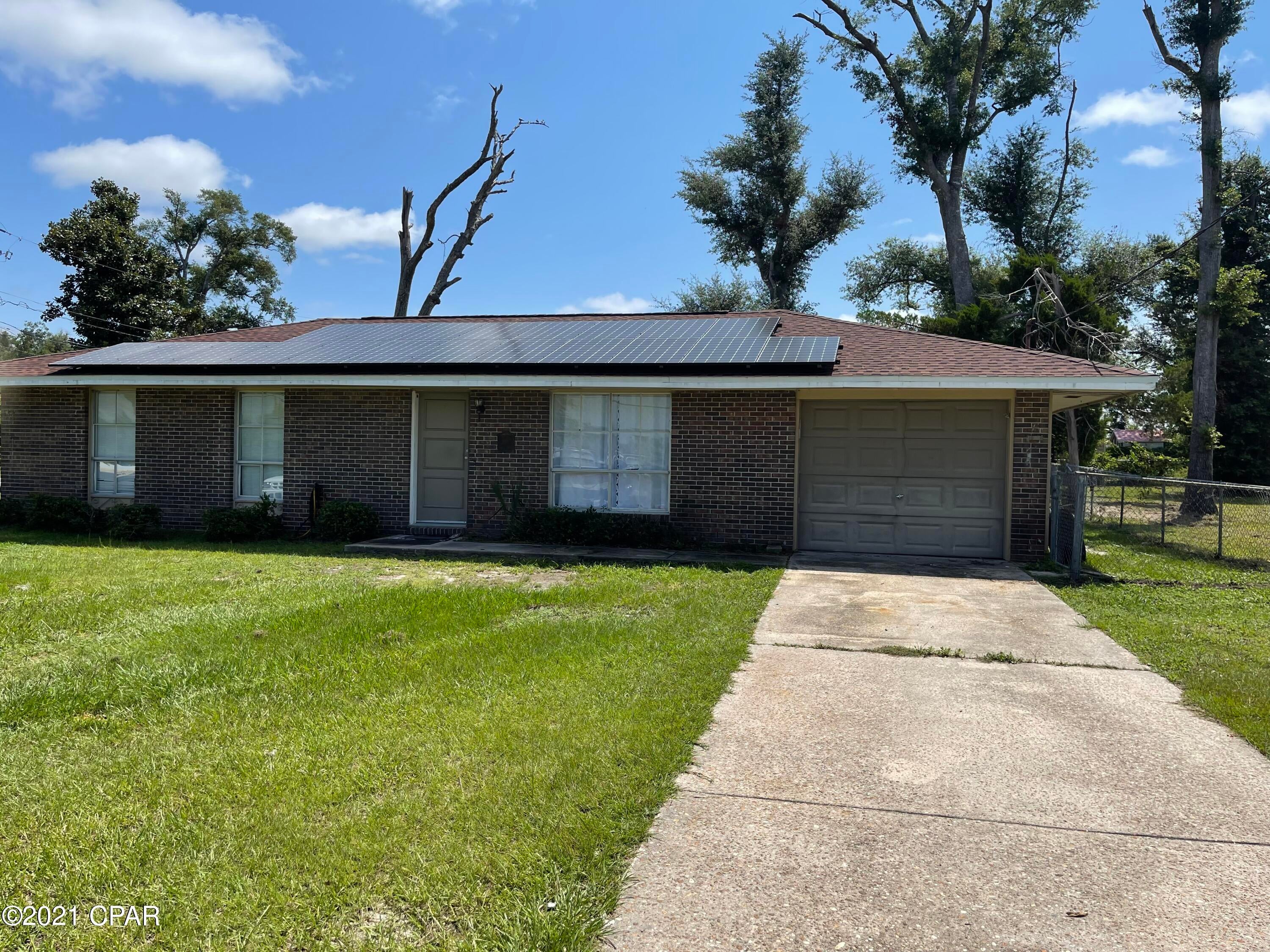 Currently under contract. Seller accepting back up offers. Great price for a great house!  New solar panels! Put your own finishing touches and make it your own! New roof and hot water heater in 2019, and new LVP flooring through the living room, kitchen, and hall. Some painting has also been done. Large fenced corner lot. Seller is offering a home warranty. Must see!  Measurements are approximate and should be verified if important.