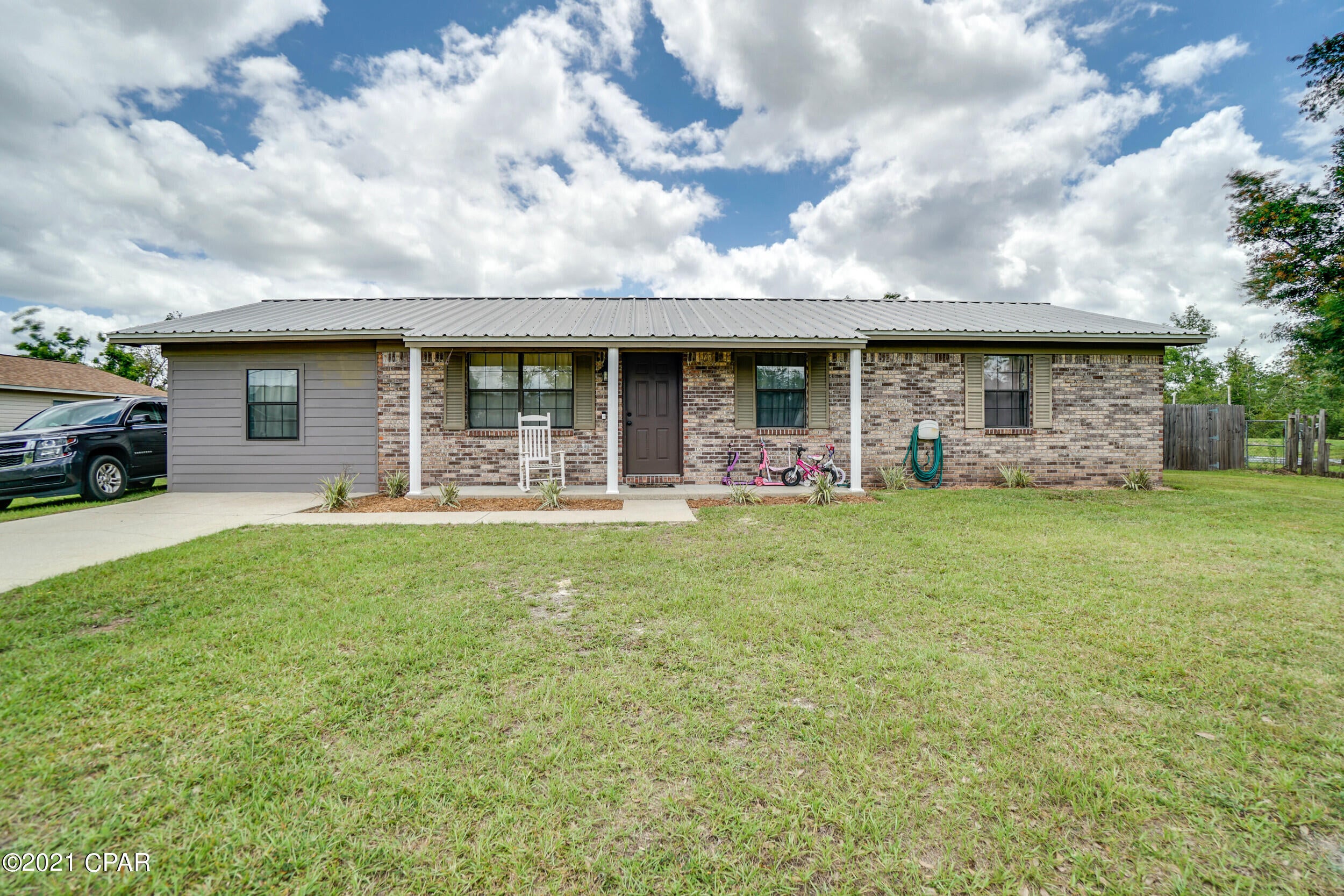 CURRENTLY UNDER CONTRACT, SELLER ACCEPTING BACKUP OFFERS A well maintained & renovated home that has everything you could possibly need! This lot comes with over half an acre of space, pole barn, and storage shed. Inside you will find a bonus room currently used as a craft room/school room but could easily be used as an at home office. Make sure to check out the family room addition that can be used as a Florida Room, Man Cave, or entertainment space.