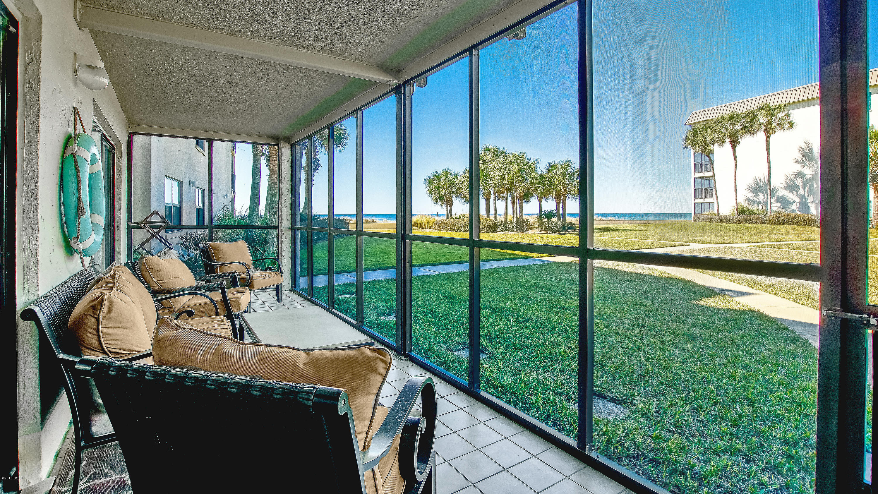 Seaside Villas is a wonderful complex that is located on the quiet, eastern end of Panama City Beach close to St. Andrews State Park. Access to restaurants, shopping and attractions is easy from this location. This is a smaller, low rise property with spacious grounds and a residential feel. This is a 2BD, 2 BA, corner location on the 1’st floor. LR and MBD open to a large screened-in balcony with great views of the Gulf and only steps from the sugar white sands of Beach. This is a cozy property with nice amenities. The amenities include a pool, a community room, charcoal and gas grills, volley ball courts, shuffle board, gated entrance and an onsite rental office. This unit is as close to Gulf front as you can be without being Gulf front.