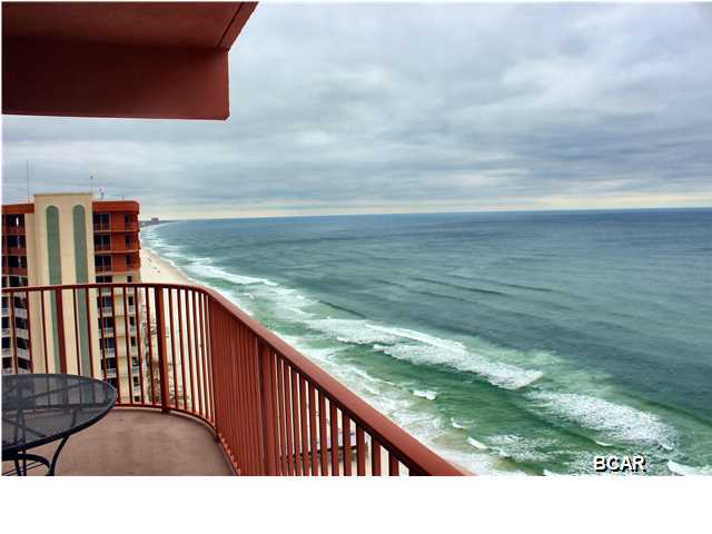 PENTHOUSE! This Type ''E'' floor-plan (1131stft; 2Bbed/2.5bath plus bunk) is the most sought after floor-plan in the building. Pair the superior layout with the penthouse, corner location and you've got this one of a kind condominium. Enjoy unobstructed panoramic views of the pool and beach from the large wrap around balcony. This fully furnished offering is tiled in the living area, has stainless steel appliances, & plantation shutters in the master and 2nd bedrooms. Shores of Panama is one of the most luxurious communities you will find on Panama City Beach offering unparalleled amenities including a massive 14,000 sq. ft. gulf side pool and hot tub, large heated indoor pool & hot tub, covered on-site parking deck, health center with fitness equipment, spa, sauna, massage therapy  and steam room, large and small meeting spaces, two tiki bars serving lunch and dinner, beach activities and rental services, free high-speed internet access, and a Kids Club activity program.