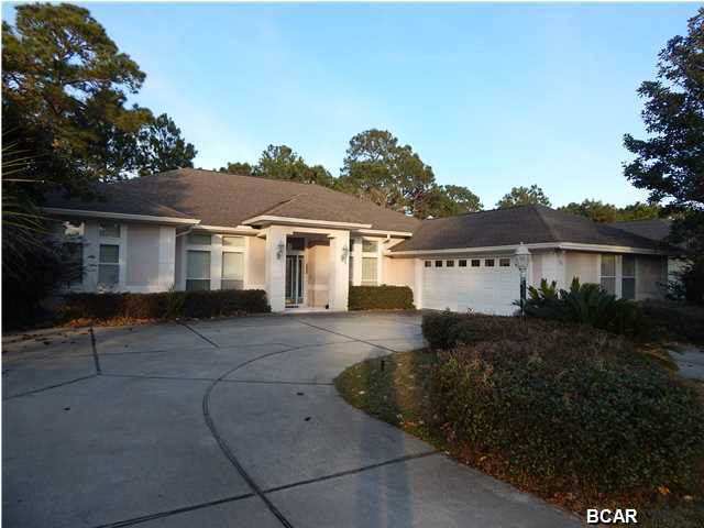 Fantastic home in the Exclusive Glades Subdivision Golf Course Community. This home at 2926 sq ft, will accommodate a large family which includes 4 bedrooms and 3 full bathrooms. As you walk into the large foyer, you are greeted by the formal dinning room with Jasmine Cherry wood. The home features a split-bedroom plan and the fourth bedroom can easily be an office. The large master bedroom exits into the screened in pool and the master bath incorporates a Jacuzzi and his/hers walk in closets. There are 10' and 12' ceilings with recessed lighting and crown molding throughout. The large family room has a fireplace, built-in cabinets and incorporates an open floor plan which ties to the large kitchen. You also have a formal living room in addition to the family room. The kitchen is