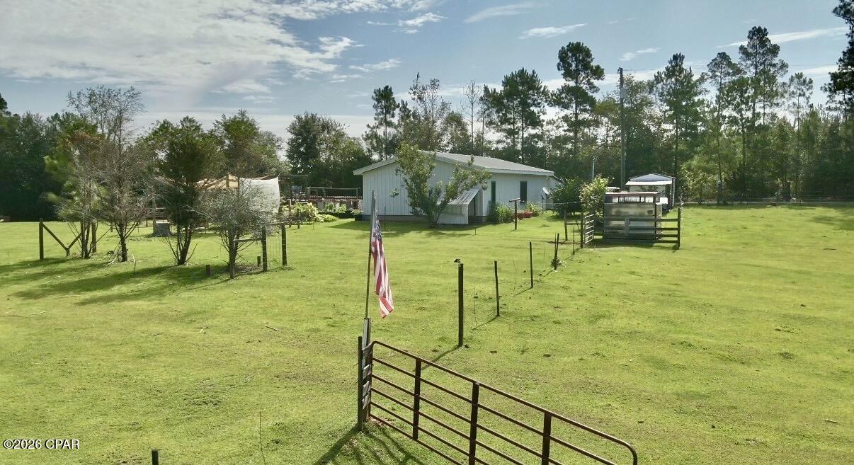 47+/- Acre Farm/Cattle operation with Home - Bonifay, Florida
Located at the corner of Broom Road and Coates Road in Bonifay, Florida, this 47+/- acre property offers a great opportunity for anyone looking for a small farm, homestead, or rural homesite. Also located just below the  Alabama-Florida state line, the property features lots of road frontage and a variety of improvements.

The home is an approximately 1,200-square-foot, two-bedroom, one-bath residence built from a red iron steel building. Several additions have been made over the years, creating a functional living space with low exterior maintenance. There is an addition to the home that has served as an extra bedroom. Spray foam insulation, tile flooring inside w/ hardi panel walls.   

The property includes an above-ground swimming pool, chicken coop, several storage sheds, and a large hay barn/ livestock barn on the south side of the property.  Hay barn is approx 30x60 w/ 10ft lean-tos. The current owner raises Florida Cracker cattle, and the property is well suited for livestock or other agricultural uses.  Cattle are included at the current asking price.

Approximately 30 acres are fenced pasture. The southern portion of the property, where the home is located, consists of well-maintained pasture, while the northern portion was previously clear-cut and offers additional space for pasture, recreation, or future improvements.

Whether you're interested in raising livestock, gardening, or simply enjoying country living, this property provides plenty of room and flexibility. With its convenient location, usable acreage, and existing improvements, it offers many possibilities for its next owner.

10 head of cattle included - all are Registered Florida Cracker Cattle.  9 cows and 1 bull.   All cows have been exposed to the bull.

Additional improvements include:

Three wells, including a primary well with a water softener, whole-house filtration system, and reverse osmosis system.
Four power poles.
30-amp and 50-amp RV hookups and campers (rental income potential)
Large pole barn with enclosed storage room.
Duramax 13 kW dual-fuel backup generator with GenerLink connection.
Farm Equipment that is included in the asking price:

Mahindra 1533 shuttle-shift tractor with front-end loader, bucket, hay spear, and bush hog.
12-foot dual-axle livestock trailer.
12-foot flatbed trailer.
5-foot mower.
Field drag and aerator.
50-gallon three-point sprayer and 15-gallon spot sprayer.
Two side-by-side UTVs.
Air compressor, hand tools, feed storage barrels, and additional ranch equipment.