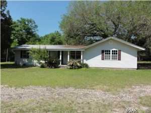 Come enjoy your own slice of privacy with this 2 bedroom 2 bathroom ranch on a 1+ acre lot! Beautiful knotty pine walls with a full stone fireplace! The kitchen is full of stained wood cabinets! This is a house flippers dream come true! So much potential in one ranch home! Dont wait to put in your offer because this listing will not last!