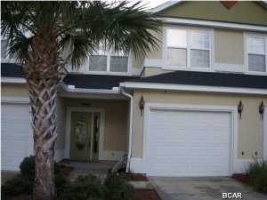 Awesome location~~~This unit has a pond view so no neighbors behind you. Living room, kitchen, dining room and 1/2 bath on first floor, Bedrooms are up stairs. Attached one car garage and low HOA fees. Community pool and its a gated neighborhood.