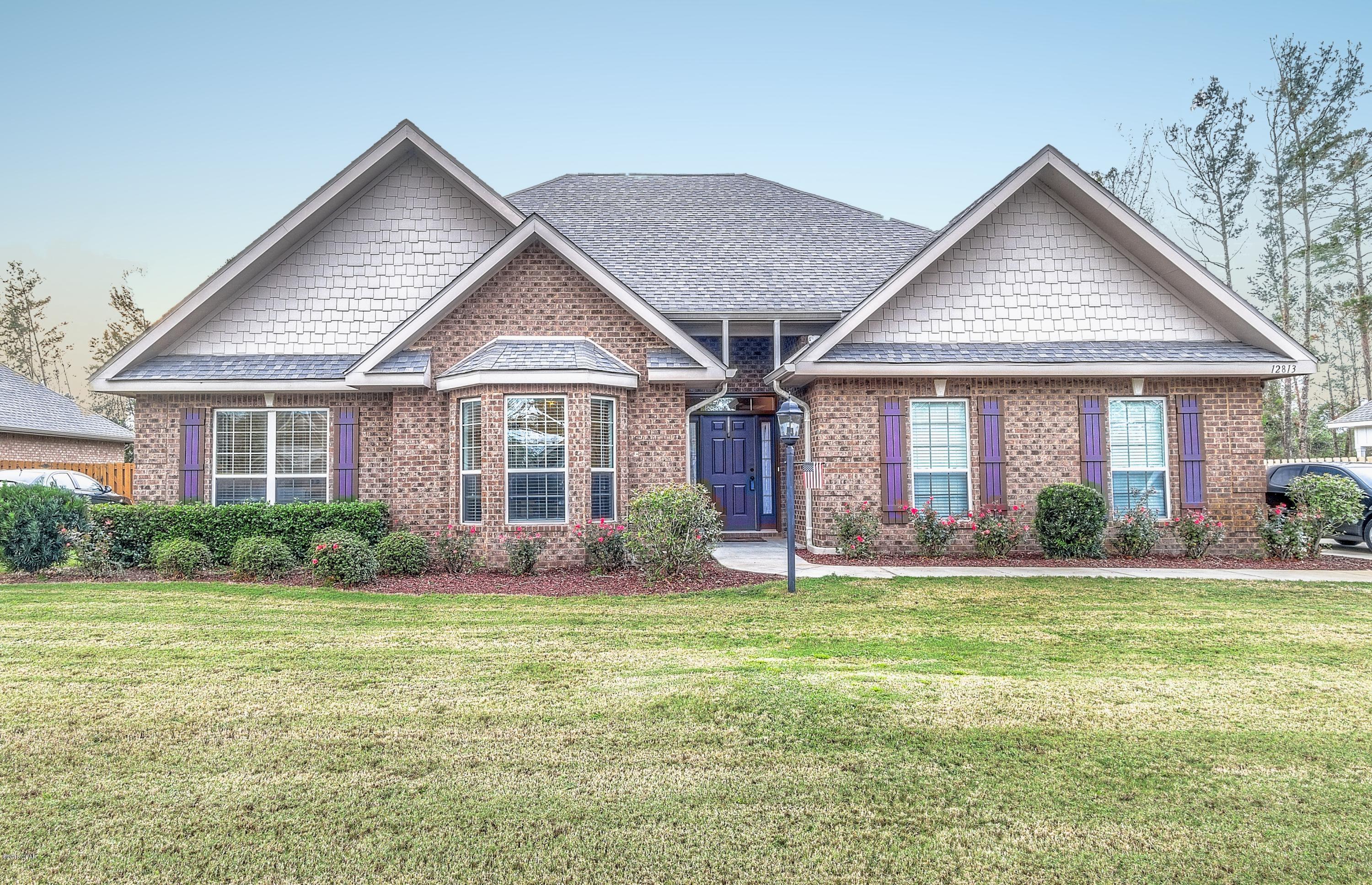 This immaculate home is located in the gated community of Lake Merial! This Preston floorplan has a gorgeous manicured lawn on a large lot, new tile flooring within the last year, arched doorways in main living areas, retractable awning on back patio, gutters, heated and cooled sunroom and large shed in the backyard. Spacious living room open to formal dining room (with pass through to kitchen, trey ceiling, and double crown molding) and kitchen. Kitchen has granite countertops, ample cabinetry, stainless steel appliances, breakfast nook and pantry. Master suite has trey ceiling with double crown molding and an ensuite with walk in shower with seat, double vanity, walk in closet and linen closet. 2 guests bedrooms (1 with a bay window) and a guest bathroom. All sizes/info/measure approx.