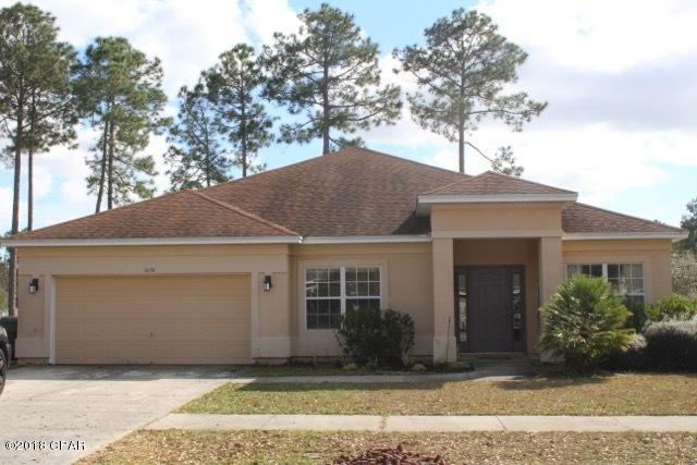 Beautiful home in The Hammocks Subdivision with 4 BD and 2 1/2 BA, formal dining room that could be used as an office, formal living room, Great room with vaulted ceilings' and French doors opening to large patio area with huge back yard with privacy fence. Split bedroom floor plan. This large home sits on corner lot .Home has hardwood and tile in living areas and carpet in bedrooms. Large kitchen with granite counter tops and breakfast area, and a home office nook in the living room. Large master bedroom features his and her closets. Two car garage. Community Pool.