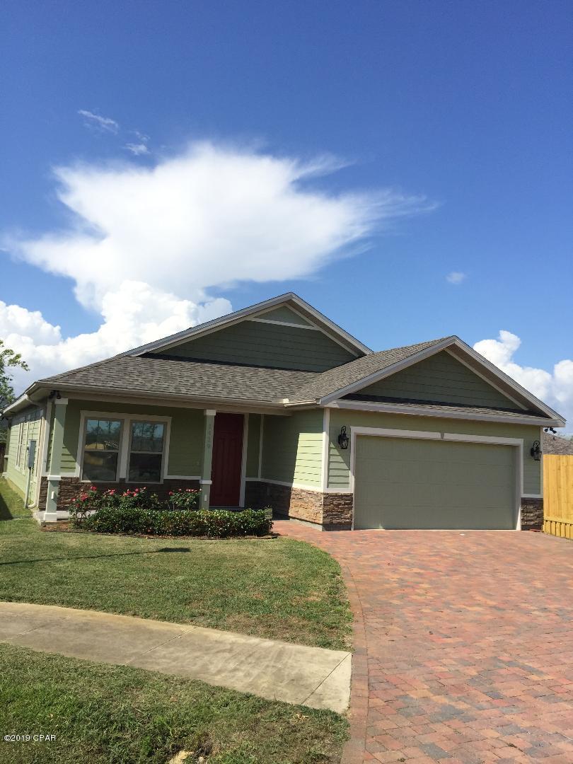CURRENTLY UNDER CONTRACT, SELLER ACCEPTING BAKK UP OFFERS. BEAUTIFUL NEWER HOME, READY FOR OCCUPANCY.  Located in smaller HIDDEN RIDGE SUBDIVISION, near North Bay Haven School.  This home features Custom Kitchen Cabinets and kitchen bar with Granite countertops.  Open floor space.  Split Bedroom Plan with a Huge Master Bedroom and walk-in closet.  Master Bath features custom glass enclosed shower and double vanity.  Tile Flooring (18'' x 18'') throughout main living area.  Ten foot ceilings with oversized doors and Crown Molding.  Large laundry room leads to double car garage with built-in work bench.  Brick Pavers used for driveway  Shallow Well for sprinkler system. Security System, Additional storage above garage.