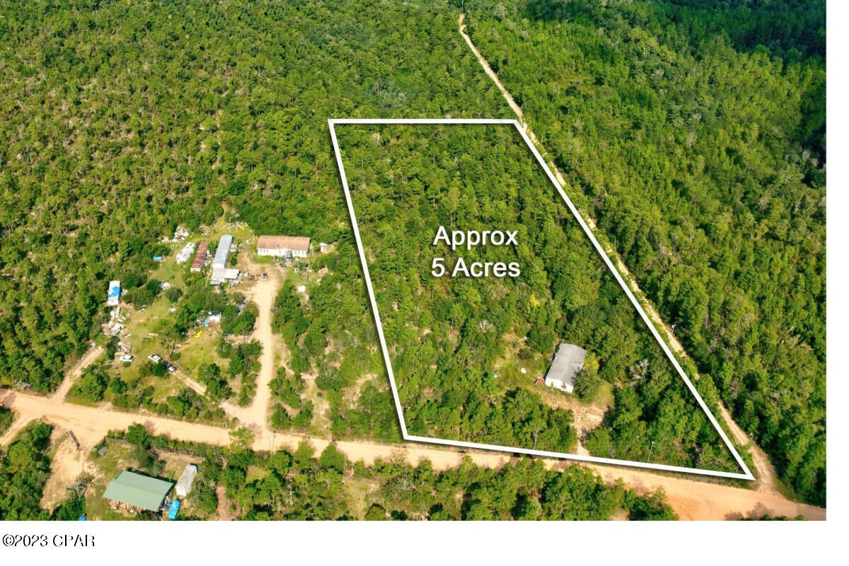 Enchanting 5-acres in Chipley, FL embraced by lush woods and mobile home with utilities (no value and being sold as is). Highly buildable, not in the flood zone and accessible via a dirt road. RV/camper allowed with exceptions, No HOA. Electricity ready; water/septic needed. Situated near esteemed schools and popular attractions. AG zoning, Parcel#: 4710001. The lot is inside a 15 acre parcel and can be purchased along with the other one.