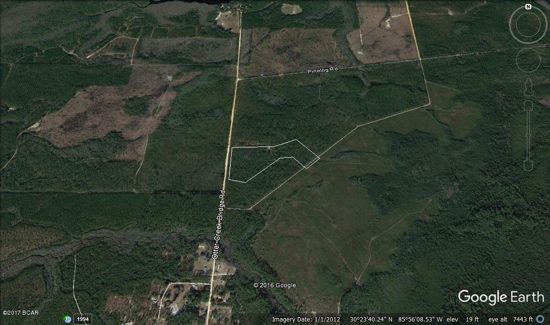 Here is your chance to grab 20.36 acres perfectly located just minutes away Pine Log State Forest, Northwest Florida Beaches International Airport, Pier Park, and the World's most beautiful beaches. Property has a pole barn with a 400 amp electric panel. It also has a 1/1 + kitchen partially complete single family residence that has been framed and wired. This gorgeous property is right around the corner from Pine Log Creek.