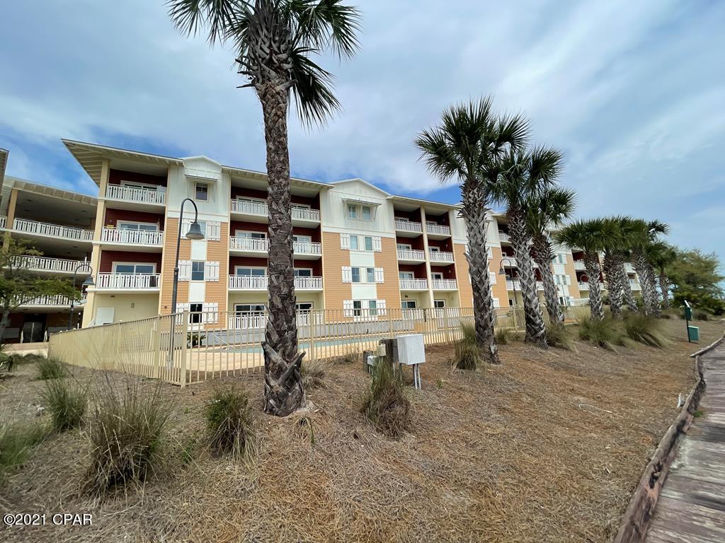Move in ready unit with CO from the city of Mexico Beach. New flooring and new paint, all repairs from Hurricane Michael have been complete. Located across the street on HWY 98 from the beautiful beaches of Mexico Beach. This condo offers beautiful views of the canal along with the walking trails around the canal. Enjoy fishing straight from the deck above the canal. Balcony looks over the beautifully renovated pool and hot tub offering a serene view of the pool and canal. The docks may be used by owners for day docking only on first come first serve basis. There is a lien on the building at this time. There is a possibility for the lien to be paid within the next 5 years if settlement is not reached. Financing options will be very limited for buyers until the lien has been resolved.