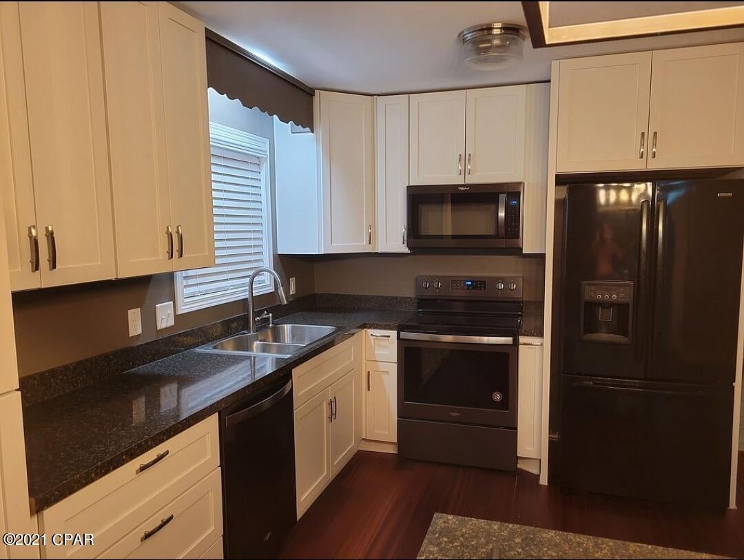 Large 3 bedrooms with 2 bathroom.  Open floor plan. Kitchen has new stove, Microwave, refrigerator & dishwasher. Privacy fenced backyard.