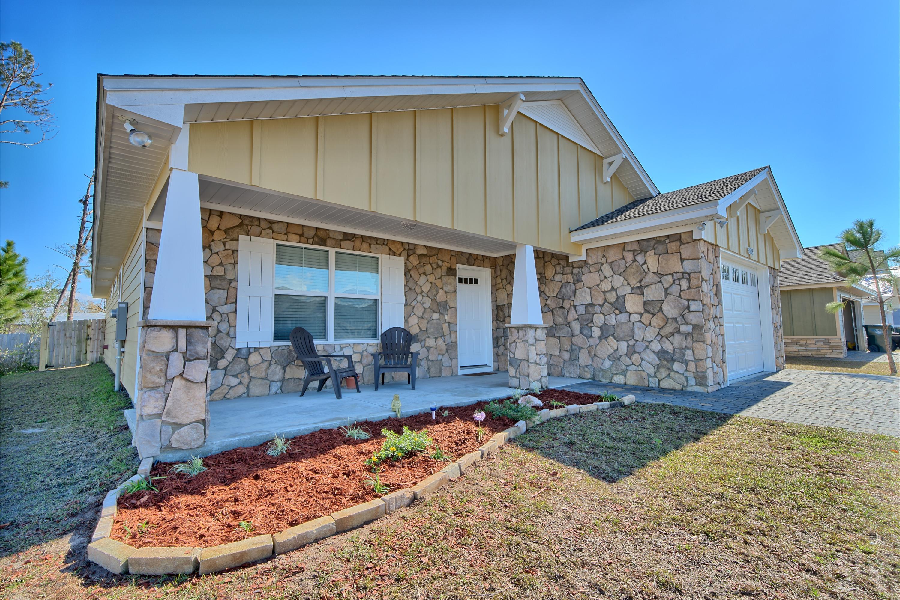 UNDER CONTRACT CURRENTLY, but Seller IS taking Back-up offers. It's here! The GEM you've been waiting for. Built in 2017 in the heart of Lynn Haven. 3 Bed/2 bath, 'practically new' home on a corner lot. This open floor plan has a  beautiful stone fireplace and hearth, recessed lighting, and hardwood floors in the main areas.

The Master bedroom has a double tray ceiling, large walk-in shower and not one, but two closets! BRAND NEW carpet in all bedrooms and fresh interior paint. Kitchen has storage everywhere, with upgraded cabinets, deep drawers and a large pantry.  Huge laundry room with room to add a Mud room!

Room sizes are approximate. Verify if important