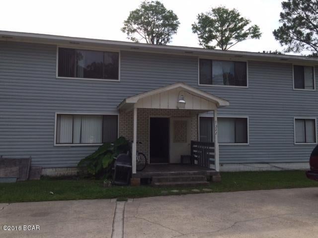 2 Bedroom (or 1 bdrm with bonus room), 1 Bath on Panama City Beach, Water, sewage and garbage included. Shared coin washer and dryer. Convenient to Navy Base