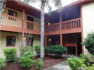 Lake front efficiency located on Lake Powell. This quiet and serene is located 2 minutes from 30A, walking distance to Carrillon Beach and only 10 minutes from Pier Park. There is a community dock, boat ramp, and storage facility for your boat. There are also 2 great pools. This sweet unit needs a little TLC to make it an awesome unit.