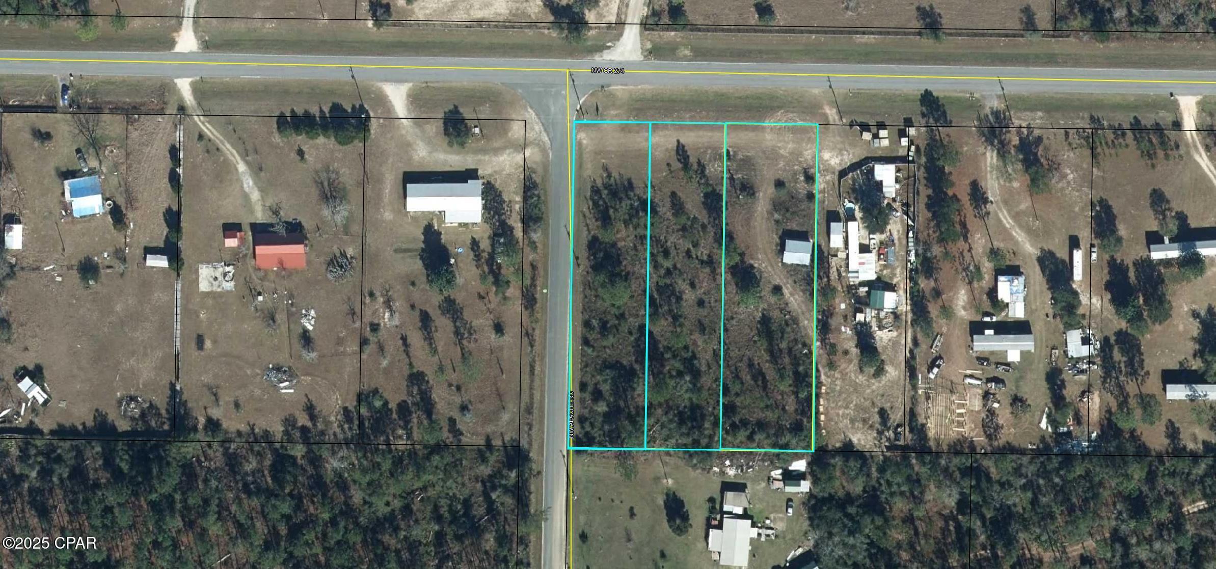 Three parcels totaling just under 2 acres offer a mostly wooded setting with a cleared area where a furnished fixer-upper cabin currently sits. One parcel is a corner lot, providing paved road frontage on two sides for convenient access.  Each parcel has its own Parcel ID number, giving added flexibility for future use or resale. The property includes a well and electric hookup already in place. A new septic system will be needed, as the previous one was shared.

Located just over a mile from the North Florida Motorplex, this could be a great location for motorsport fans or investors interested in the area's growing attractions. While the land was previously surveyed, the seller no longer has a copy available.  Contact your realtor today to schedule a showing and explore the potential this property offers.