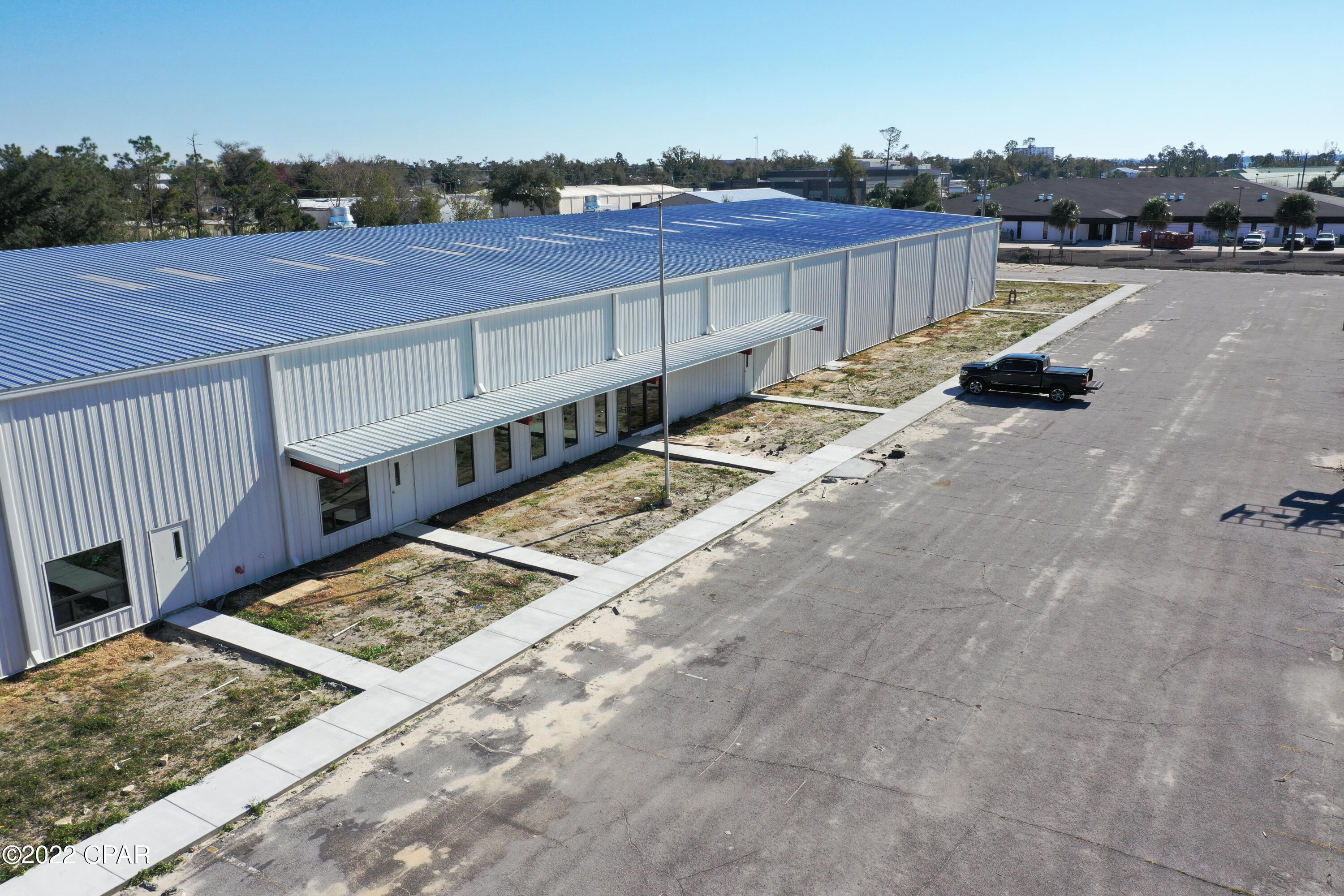 The former ''Bell Signs Building'' is near completion of the repairs following Hurricane Michael and the tenant improvements for the first tenant CrossRoads Building Supply. CrossRoads will be occupying the north-end of the building in February.  The sellers are finalizing a lease for the remainder of the building with a long-term credit tenant. The building is offered for sale ''as-is'' with tenant improvements for CrossRoads completed. Lease terms, financials, plans, etc. available upon request and signing a confidentiality agreement. The remaining work to be completed by the new owner will include: site work, paving, landscaping, high-bay lighting, electrical and tenant improvements specific to the new tenant's requirements.