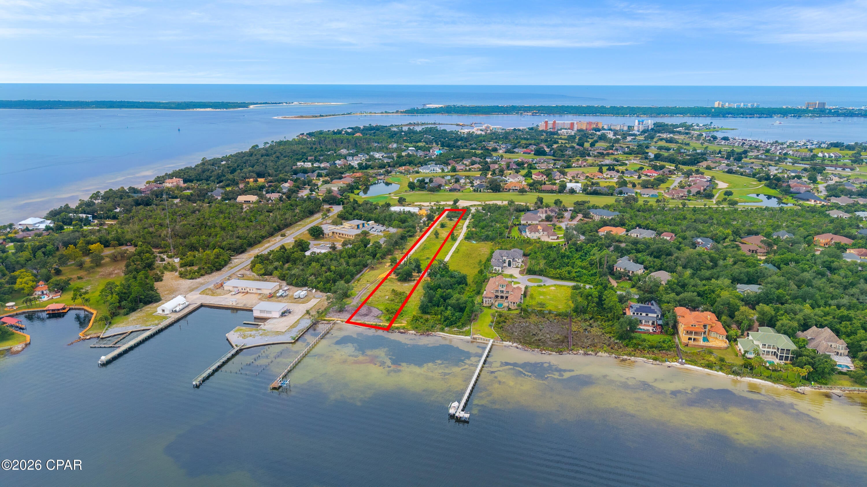 Rare opportunity to own 1.69 acres of cleared, filled waterfront land with approximately 70 feet of waterfront frontage, seawall already in place, and an incredible location just minutes from Gulf access. At approximately 1100 feet deep, this expansive parcel offers exceptional privacy, flexibility, and room to create your ideal waterfront retreat.  
This property includes a shared driveway already in place and plans for a carriage house, providing an excellent starting point for development. Imagine building your dream home, adding your own private pier and keeping your boat right in your backyard, waking up to stunning sunrises, and ending your day gazing at the gorgeous Bay. 
This 3627 Delwood Beach Rd. property as it all. Substantial acreage, existing seawall, cleared and filled land, and close proximity to Gulf access, this is truly a special waterfront opportunity, a private oasis. Perfectly positioned just outside two highly desirable upscale neighborhoods, this property offers the rare combination of privacy, space and convenient access to the area's best amenities. The location provides an ideal lifestyle for boating, golfing, dining and beach days, all just minutes from your home. Seller is a licensed Realtor in the State of Florida.