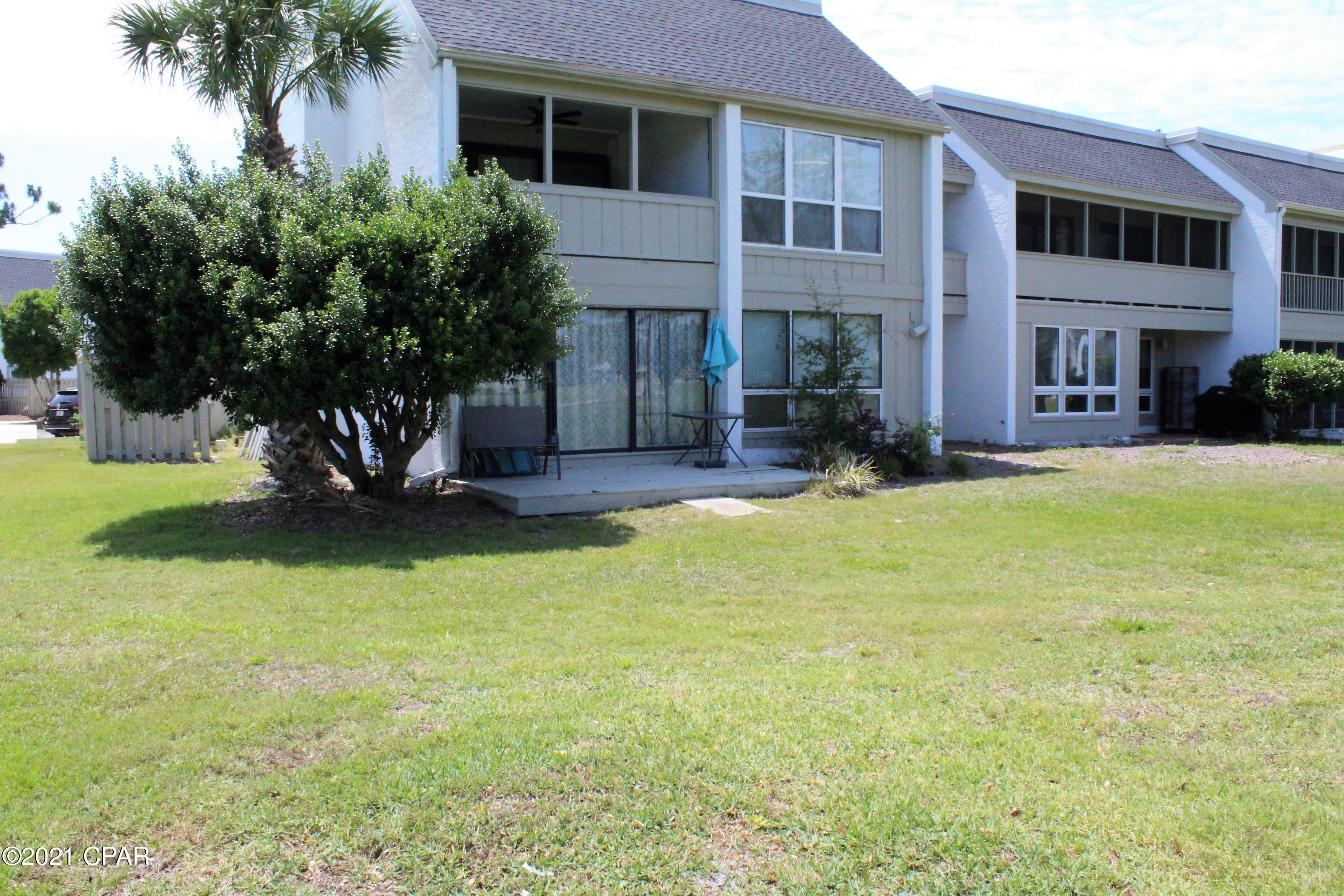 Currently under contract, Seller accepting backup offers. End Unit overlooking the 18th fairway and a beautiful pond, love the view!  All on the first floor in this open and spacious condo.  Lots of windows with great views.  Master Bedroom with walk-in closet.  Second bedroom also has walk in closet.  Patio in front and deck in back.   Come and See!
