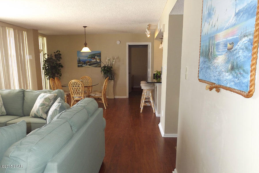 Are you looking for the BEST FLOOR PLAN on the beach? This is it! 60 ft. of gulf view;from LR,DR,kitchen,both bedrooms. Huge rooms, huge closets(lg. enough for bunk beds) Split floor plan with a BR & bath on each end of condo. Condo has been updated with a wow factor! Granite counter tops,new cabinets, stainless steel appliances, new flooring, Master bath with walk in tile shower, 2 vanities. Rental Co. has been on site for 30 years, with alot of repeat business. Awesome income for you.