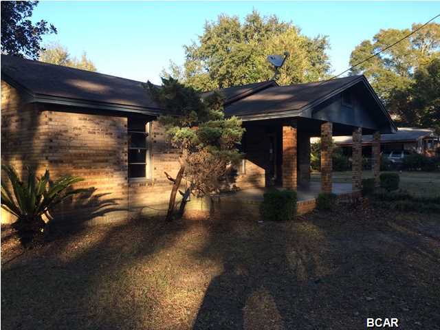 This brick home sits on a triple lot. It has a large front porch and a detached 22x40, 2 car garage and storage room. The yard is fenced in and large with lots of mature landscaping. There is a breakfast area off the kitchen as well as a dining are off the living room.Plenty of space for RV's, boats, and lots of parking.