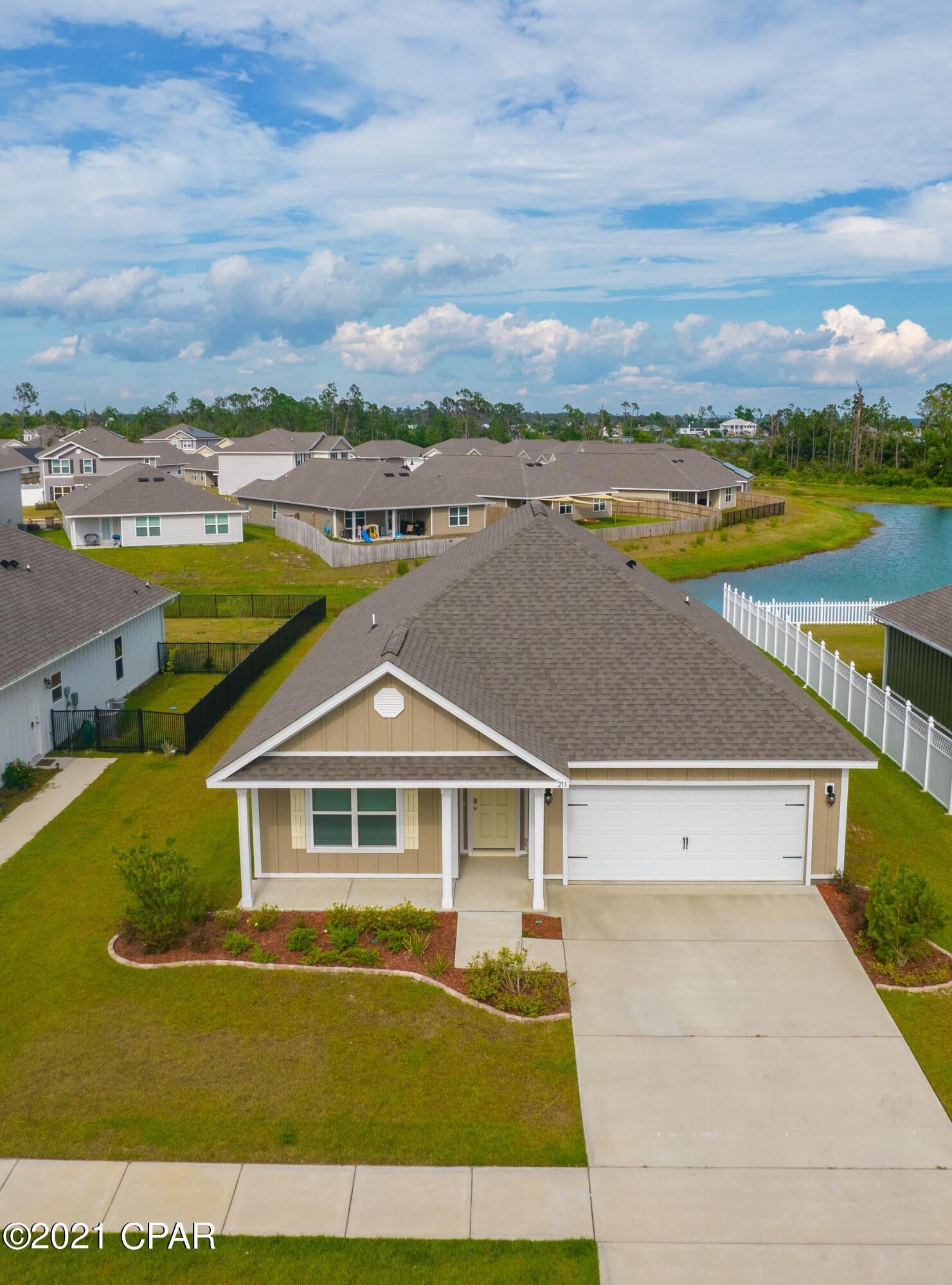 *UNDER CONTRACT TAKING BACK UP OFFERS*''Like new'' is an understatement. This ''Rhett'' plan home has not been lived in full time. It is  completely free of any nail holes in the walls and signs of wear and tear. The main area is an open floor plan with a center island in the kitchen overlooking the great room and lush backyard.  Beautiful tray ceilings are both in the living room and master bedroom. The master suite has separate shower and  garden tub not to mention  a walk in closet. This immaculate home has  9 ft ceilings and many upgrades to include beautiful custom blinds. You can enjoy an afternoon relaxing on your covered porch or taking a swim in your community pool! Schedule a showing for a home that will not disappoint!