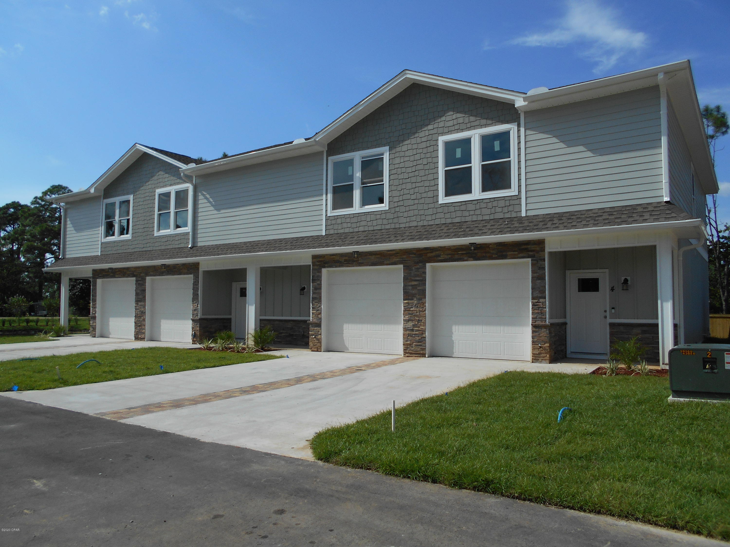 Back on Market--Financing fell thru!!  Want BRAND NEW, LOW HOA FEES, & CLOSE TO THE BEACH in a small 16 unit complex?? Welcome to Seaside Heights! This 1580sf, 3 bd/2.5 bath home has it all. From Hardie Board & stone siding, to LVP flooring throughout, 9' ceilings, upgraded solid surface counter tops, and an all stainless appliance (including fridge) package. Smart technology includes electronic front door lock, Ring door bell, and the garage door opener. Home has a sprinkler system for fire safety, and HOA docs will allow short term rentals and owners pets. HOA fees to cover structure, roof and flood insurance, trash removal and grounds keeping. Fees are subject to change once complex is complete. Don't miss this great opportunity.