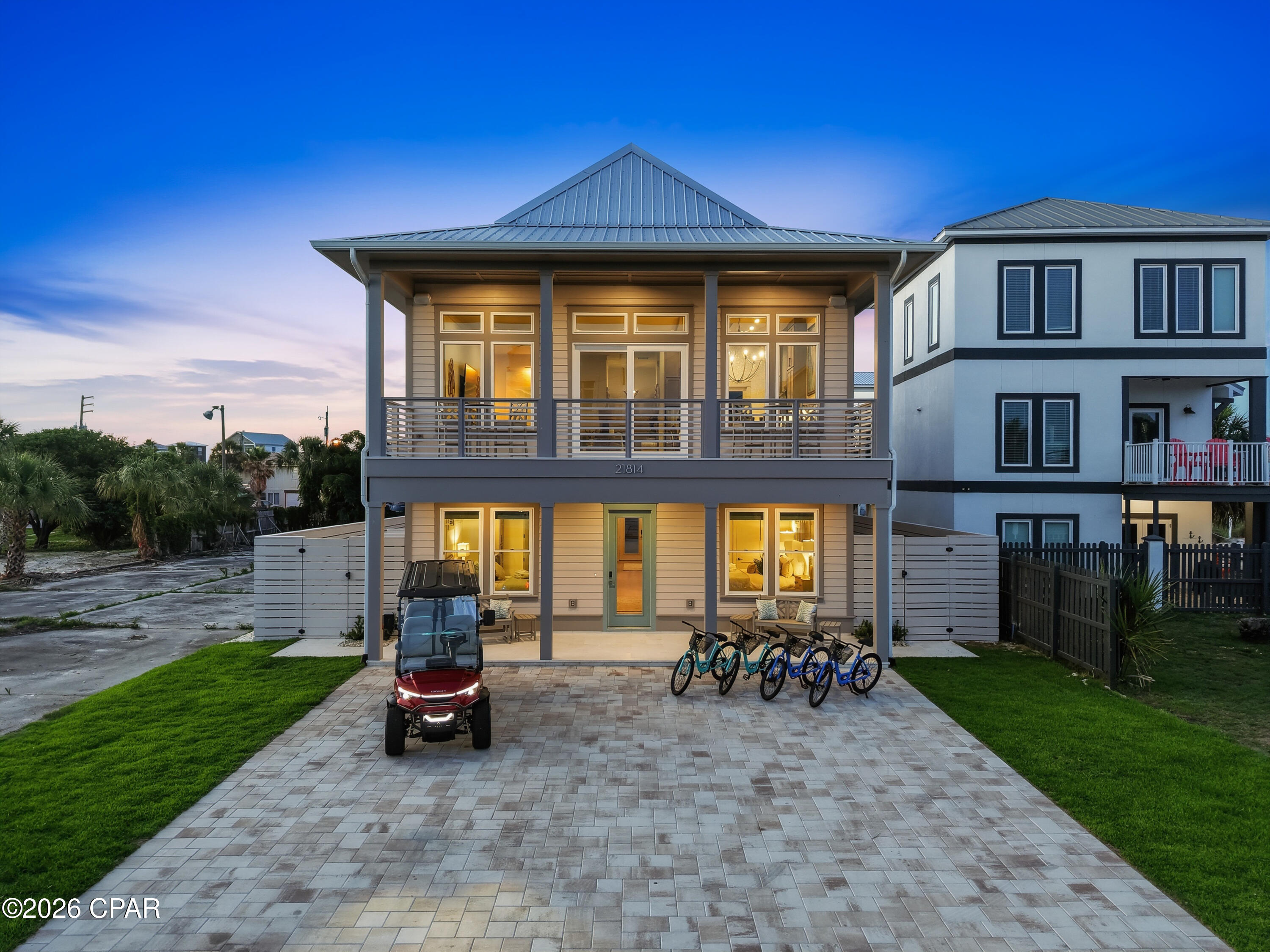 Experience the ultimate in luxury coastal living with this newly constructed beach retreat on the highly desirable West End of Panama City Beach. Offering 3,302 square feet of thoughtfully designed living space, this exceptional home features 6 spacious bedrooms, each with its own private ensuite bath, creating the perfect setup for large families, vacation guests, or premium rental opportunities. Designed to comfortably accommodate up to 16 guests, the home showcases an expansive open-concept great room ideal for entertaining, along with a separate recreation room conveniently located near the pool area. Two laundry rooms provide added convenience for larger groups and extended stays. Perfectly positioned for enjoying the Gulf Coast lifestyle, this property offers beautiful Gulf views and beach access located just across the street, with two public access points only a short walk away. The outdoor living experience is equally impressive, featuring a large private pool with a sun shelf that can also function as a spa, a covered pavilion, and a fully equipped outdoor kitchen designed for entertaining. The backyard oasis is enhanced with lush artificial turf, generous green space, and an integrated Sonos sound system throughout the pool area, balconies, and main living spaces.
Additional highlights include parking for up to six vehicles and a fully furnished interior professionally designed with refined coastal elegance. Whether you are seeking a primary residence, second home, or high-performing short-term rental investment, this turnkey property is fully equipped and ready for immediate enjoyment or rental management.
Just steps from the sugar-white sands and emerald waters of the Gulf of Mexico, this home offers the perfect combination of luxury, location, and investment potential on Panama City Beach.