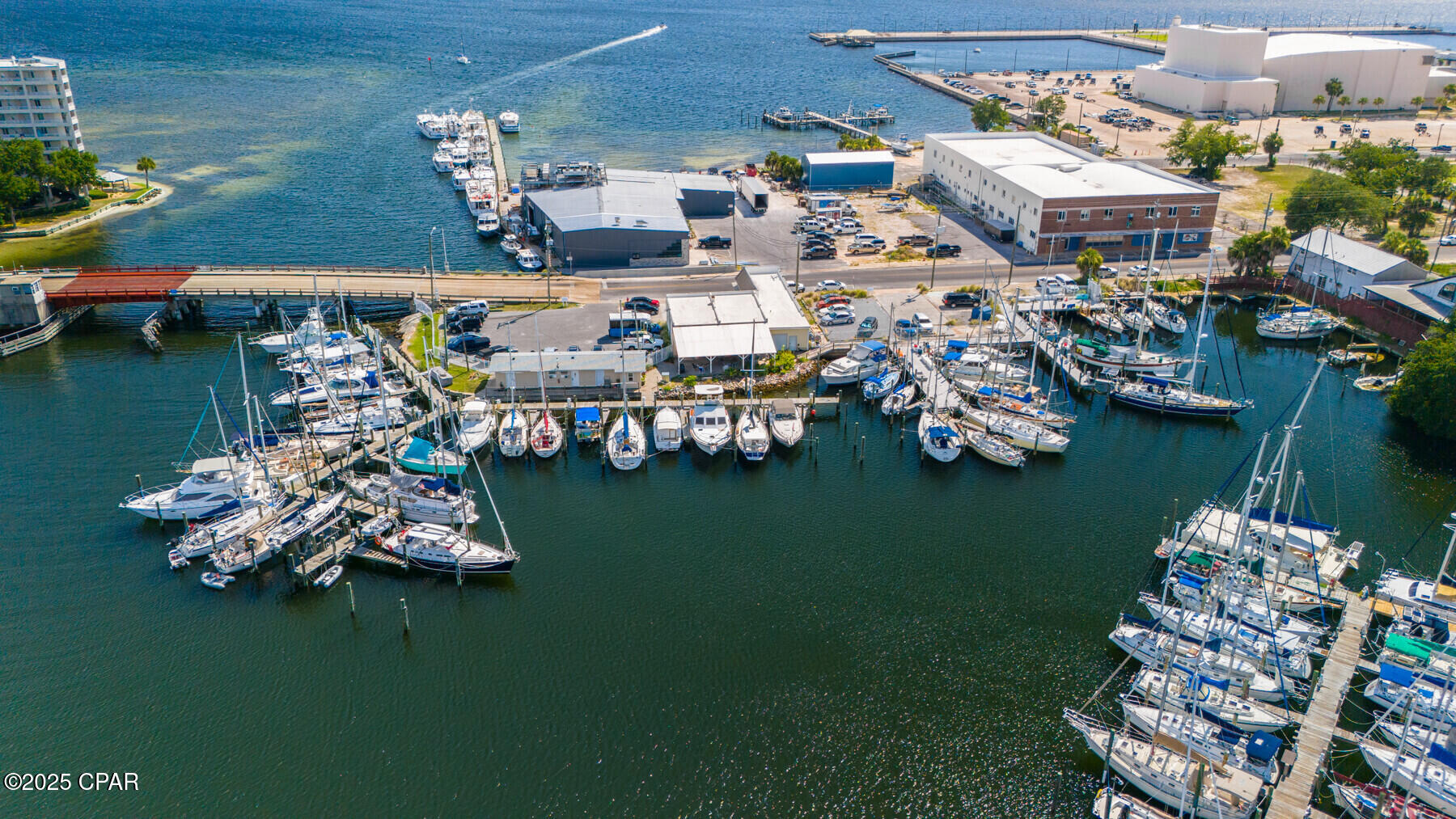 'Bristol Harbor Marina' located in the heart of revitalized downtown Panama City, FL. This 49 slip passive income boutique marina presents a prime opportunity to own a thriving marina with excellent access to the Gulf, via nearby Saint Andrews Inlet. The marina features newer fixed piers, electrical, water, pump out at every slip, gated, security, commercial office and retail, parking, and outdoor covered pavilion. Its close proximity to revitalized downtown Panama City and convenient direct access to the pass and Gulf ensures a consistent demand for slip occupancy. Recognized as a 'Resilient Marina' by the Florida Department of Environmental Protection, Bristol Harbor boasts the highest ranking for environmental sustainability and resilience. The marina is home to several commercial and recreational charter operations, further enhancing its appeal and visibility. Buyers have the opportunity to expand the business further by increasing rates and focusing on long term commercial tents. In addition to the marina, this offering includes a recently renovated 3-suite office building on site. The offices are leased through 2025 providing additional cash flow.