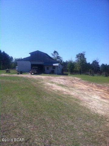 Horse barn with stalls plus mobile home and 58.3 acres of pasture and woods