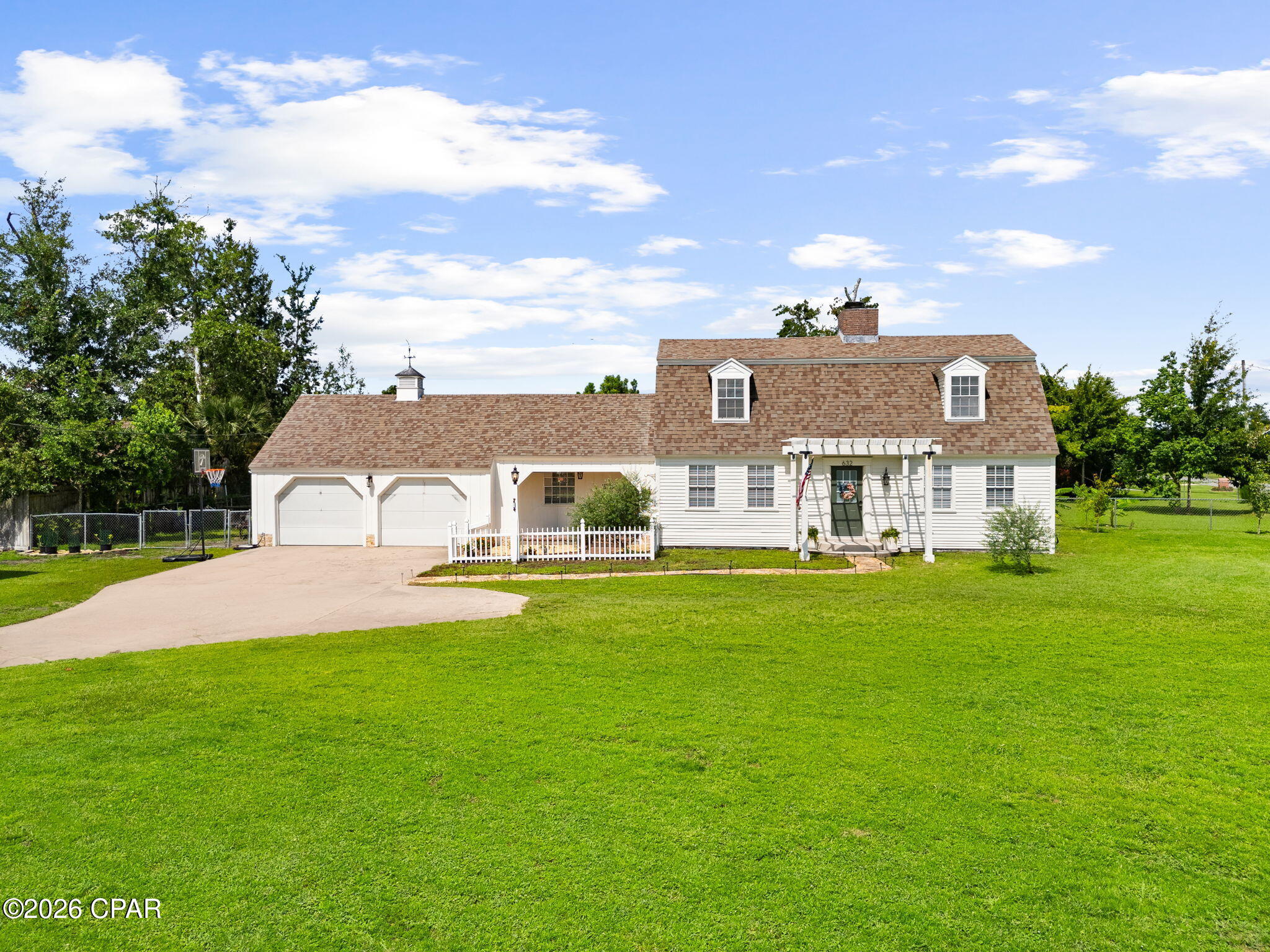 OPEN HOUSE SUNDAY, JULY 26TH FROM 12-2PM
Welcome to 632 Mount Holyoke Street, a beautifully renovated home nestled on approximately 0.73 acres in the highly desirable College Point area of Lynn Haven. Offering the perfect blend of modern updates, flexibility, and freedom, this property provides the opportunity to enjoy country-style living while remaining conveniently close to town. Located in unincorporated Bay County, homeowners benefit from no city taxes, lower utility costs with well and septic service, and an X Flood Zone designation, meaning flood insurance is not typically required by lenders.

For military buyers, this home also features an assumable VA loan, providing a valuable financing opportunity. Conveniently located approximately 14 miles from Tyndall Air Force Base, 13 miles from NSA Panama City, and 14.5 miles from Northwest Florida Beaches International Airport (ECP), this property is well-positioned for both military and civilian commuters.

Known for its golf cart-friendly roads and relaxed coastal lifestyle, College Point is one of Bay County's hidden gems. Residents enjoy easy access to outdoor recreation, waterfront parks, and community amenities while maintaining the privacy and space that larger lots provide. The Lynn Haven Sports Complex is just minutes away, offering ball fields, walking trails, playgrounds, and year-round recreational activities.

Whether you're dreaming of a garden, hobby farm, or simply extra space to spread out, this property offers endless possibilities. County regulations allow for chickens, ducks, and other homesteading opportunities. Buyers may also have the ability to add future improvements such as a pool, pole barn, workshop, detached garage, or accessory dwelling unit (ADU), subject to county permitting and approval.

Inside, the home showcases extensive renovations with fresh paint, updated lighting, elegant textures, modern wallpaper accents, and abundant natural light throughout. The beautifully updated kitchen features quartz countertops, all-new stainless-steel appliances, a glass-top electric range, and ample cabinet and prep space for everyday living and entertaining. Just off the foyer, a formal dining room provides a welcoming space for gatherings and holiday meals.

The flexible floor plan offers room to adapt as your needs change. The current office adjacent to the living room could easily serve as a fourth bedroom, nursery, playroom, or second living area. The oversized laundry and utility room provides exceptional versatility and could function as a home office, quilting or craft room, canning and food-prep space, hobby room, mudroom, or additional storage area.

Above the garage, a spacious unfinished storage area presents even more opportunity. With climate control and finishing touches, this area could become a reading nook, playroom, hobby space, bonus room, or expanded storage area accessible from one of the upstairs bedrooms.

Outdoor enthusiasts will appreciate the property's proximity to multiple waterfront parks. One bayfront park is located approximately 900 feet away, while another waterfront park featuring a pavilion and playground is just 0.4 miles from the home. Whether you enjoy fishing, kayaking, evening walks, or simply taking in the bay views, you'll love having these amenities so close by.

If you've been searching for a move-in ready home that combines modern updates, military convenience, homesteading potential, room to grow, and the freedom of county living, 632 Mount Holyoke Street is a rare opportunity in one of Bay County's most sought-after waterfront communities.