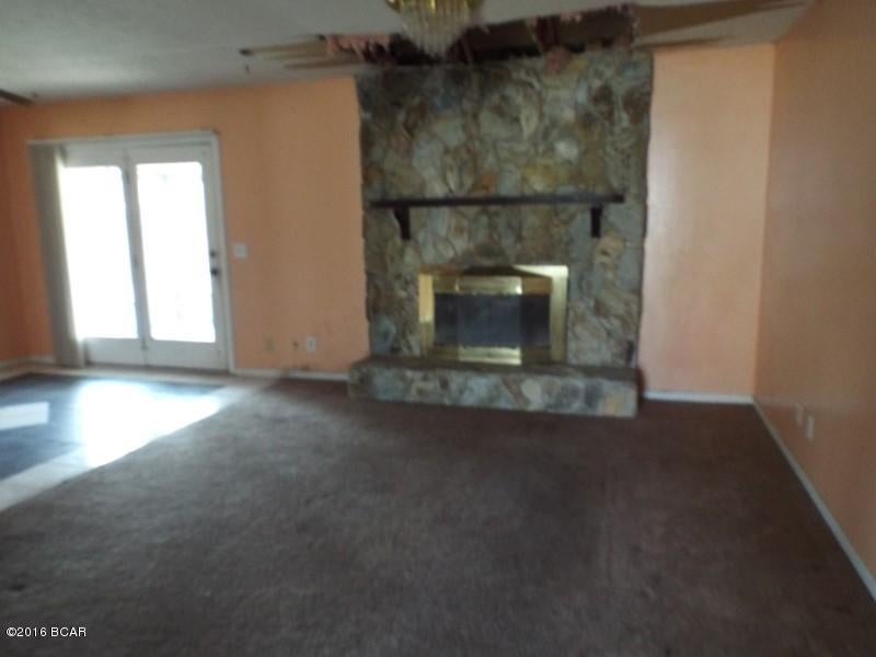 Three bedroom two bathroom home with enclosed garage as bonus room needing some TLC offered as is.  All sizes are approximate or taken from other sources please verify accordingly.