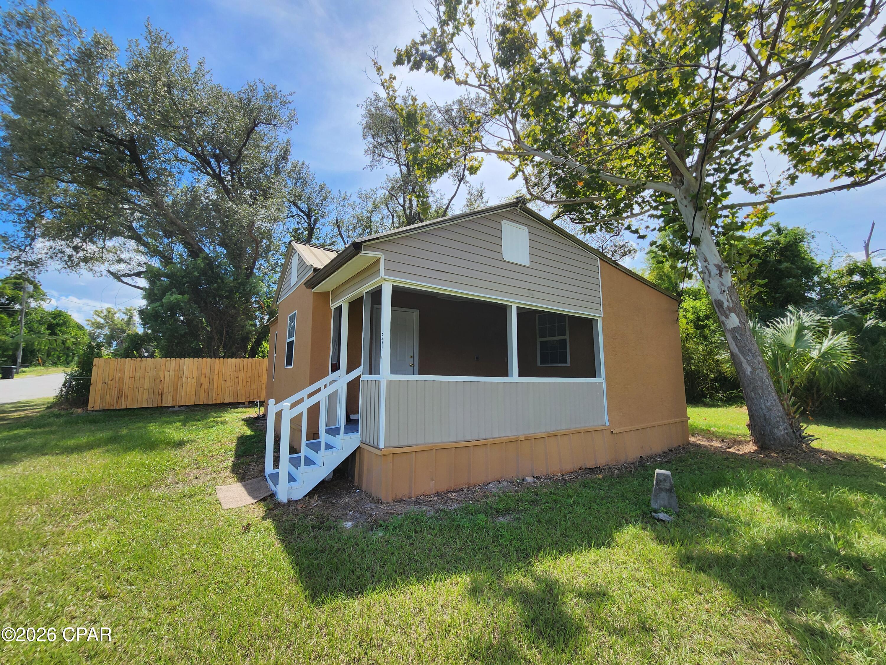 Price Improvement! Hurry and check out this wonderful home. Updated single family home with an interesting history as a Catholic School!   Many years ago, it was relocated from the original location off of Business 98 to the current location on 1/3 of an acre.   Kitchen features a new refrigerator, stove and vent hood.  The flooring including joists were replaced within the last two years. Although, there is no central a/c, the home has a built-in GE heat pump system in the main living area and a window a/c in the bedroom keeping the home comfortable.  Seller has an updated survey. (All details should be verified by the appropriate specialist).