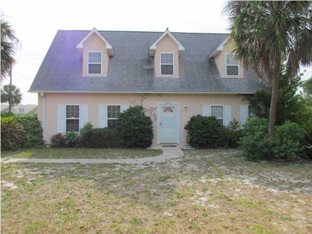 3 bedroom 2 bath home with attached apartment over the 2 car garage that has 1 bedroom 1 bath living are, dining and full kitchen and stackable washer & dryer- with deck. The main house has the foyer, over sized master suite ,master bath, den, living, dining and kitchen and sunroom and 1/2 bath are down stairs- 2 over sized bedrooms and 1 bath upstairs.   Tenants for the property must be one family- this is a single family residence. This home is close to Pier Park.