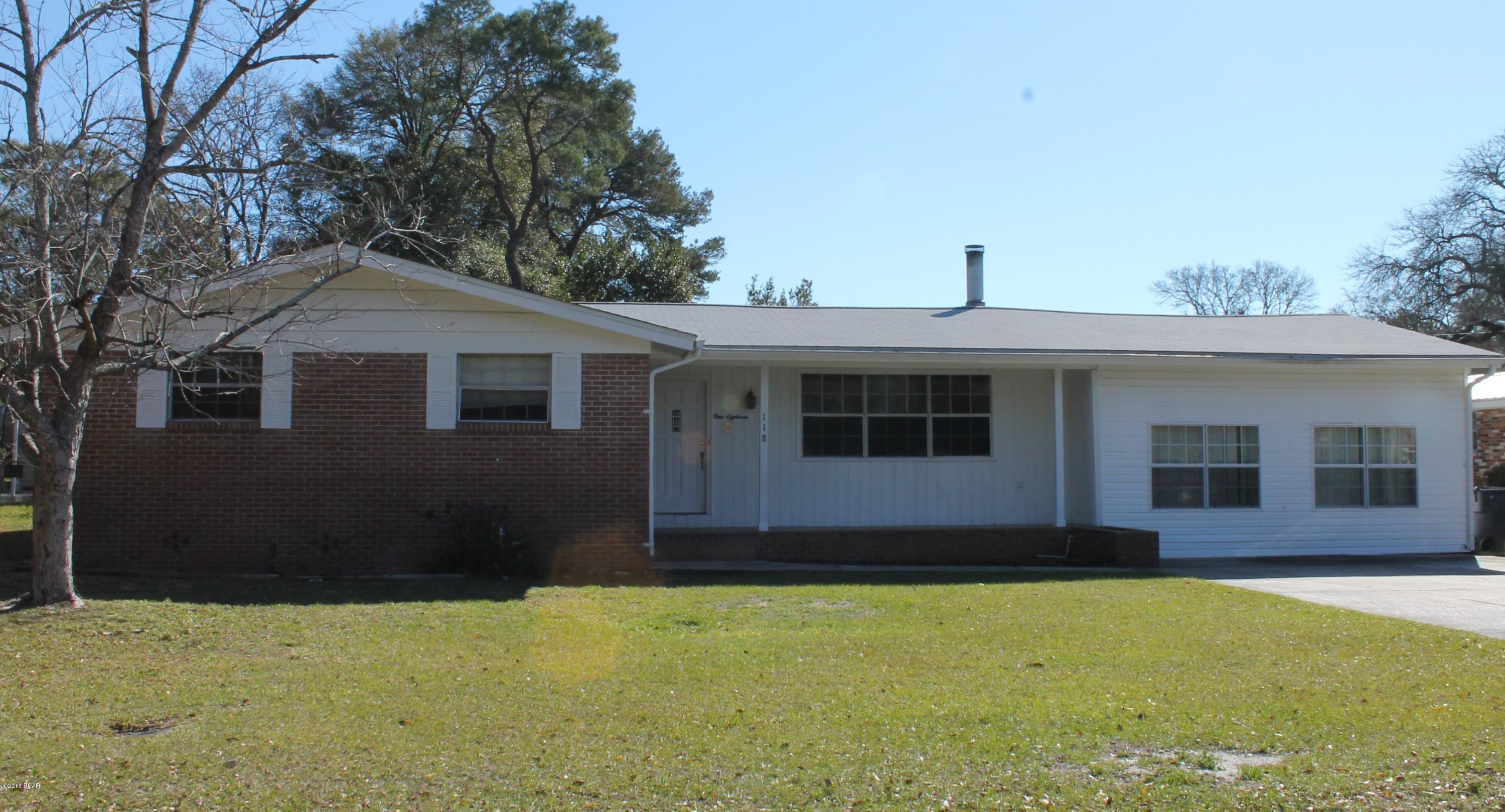 This home has it all...location, space and well maintained!!! This home sits across the street from Martin Lake! Only minutes from Tyndall Air Force Base! This home has a family room with a stone fireplace, large dining room and kitchen, large bonus room that could be used for den, game room or bedroom (your choice). 3 nice size bedrooms, 3 full baths, a large laundry room, a 19x12 screened in back porch and a super nice size fenced in back yard!!! Make your appt. to view this home today because at this price it won't last long!!! PRICED TO SELL!!! All room sizes are approximate please verify if important. *More pictures to come!